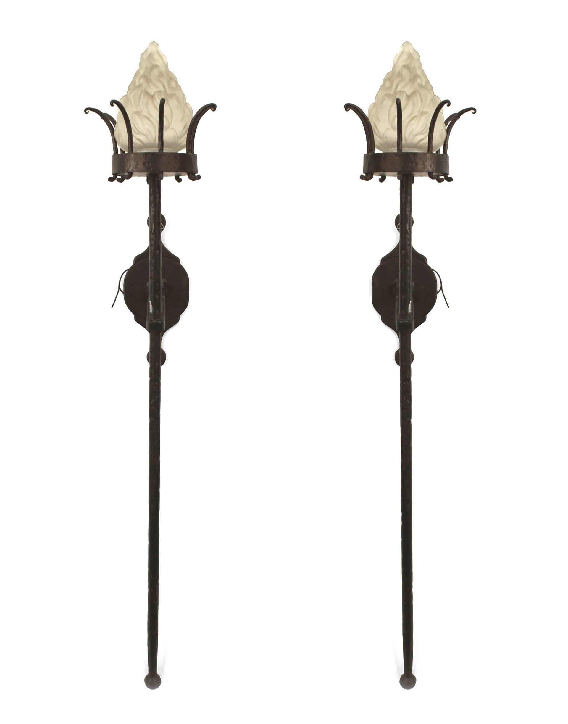 4 Italian Renaissance style (1st half of 20th Century) wrought iron large wall sconces with a long pole ending in a glass flame shaped shade (PRICED EACH)
