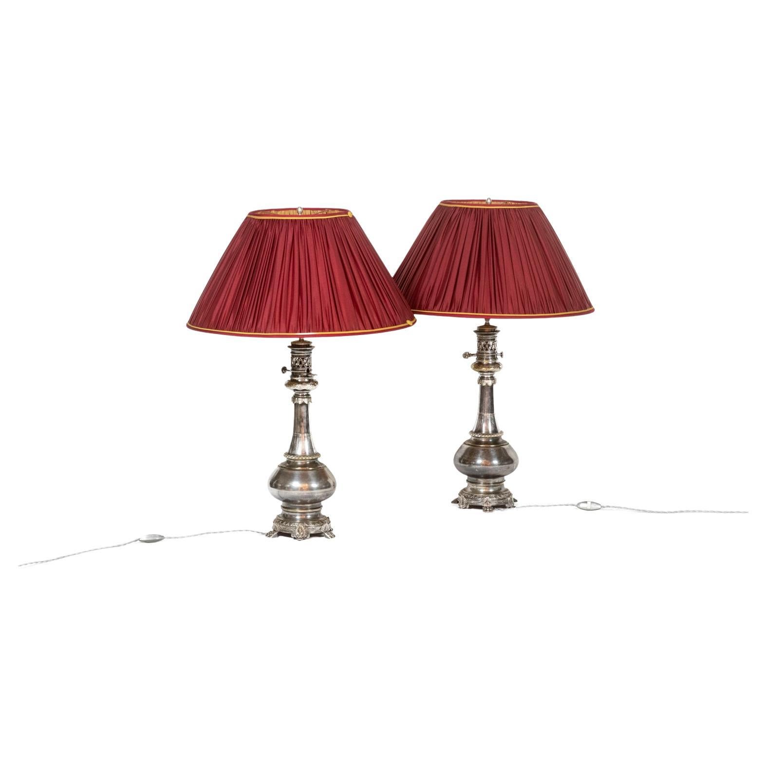 Pairs of lamps in metal and silvered bronze. Circa 1880. For Sale