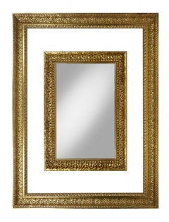 Pareja de grandes espejos de pared italianos de madera dorada tallados a mano