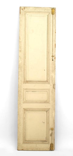 Pair of French Louis XV Style Gilt and White Painted Doors
