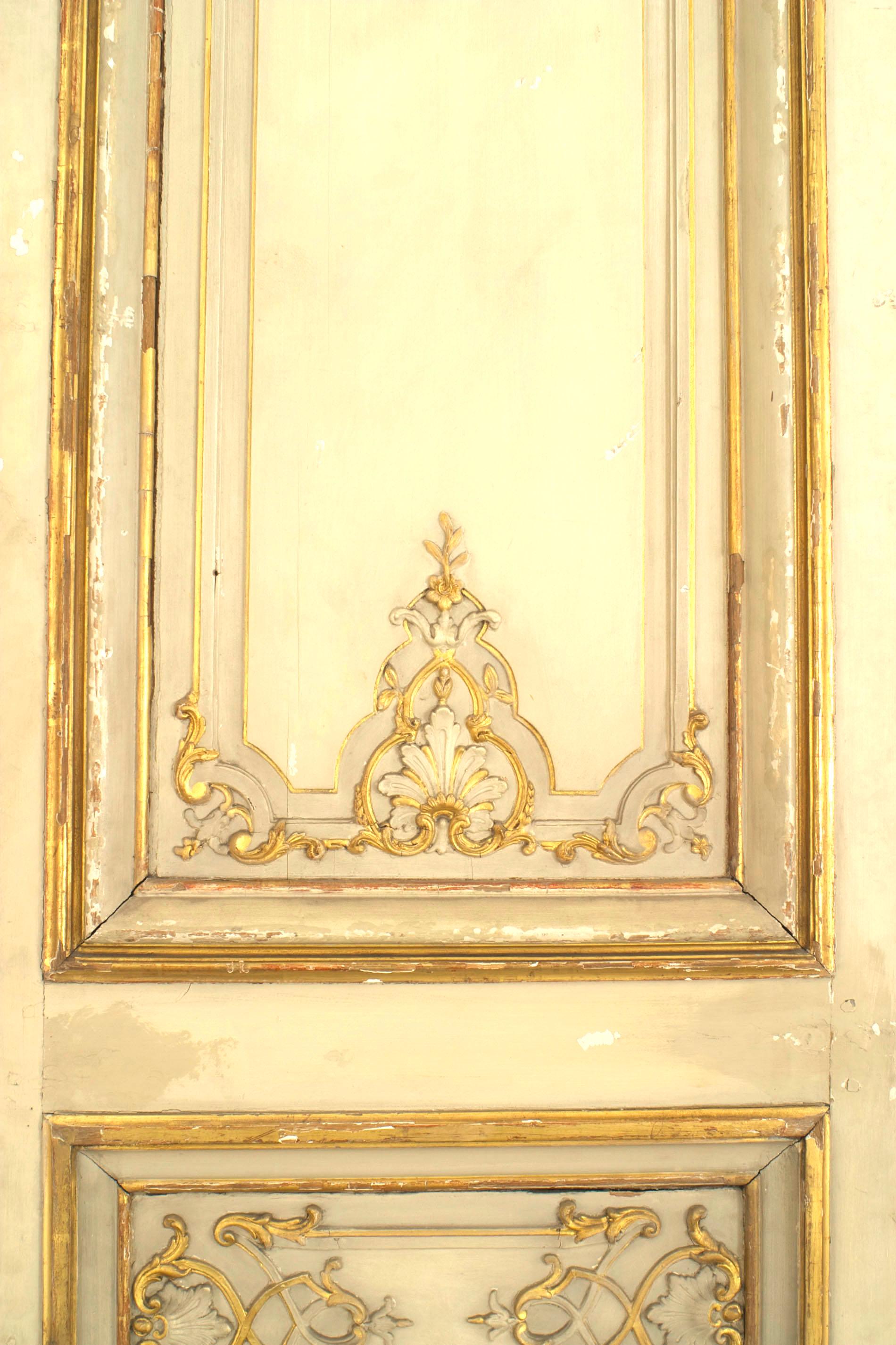 Pair of French Louis XV Style Gilt and White Painted Doors In Good Condition For Sale In New York, NY