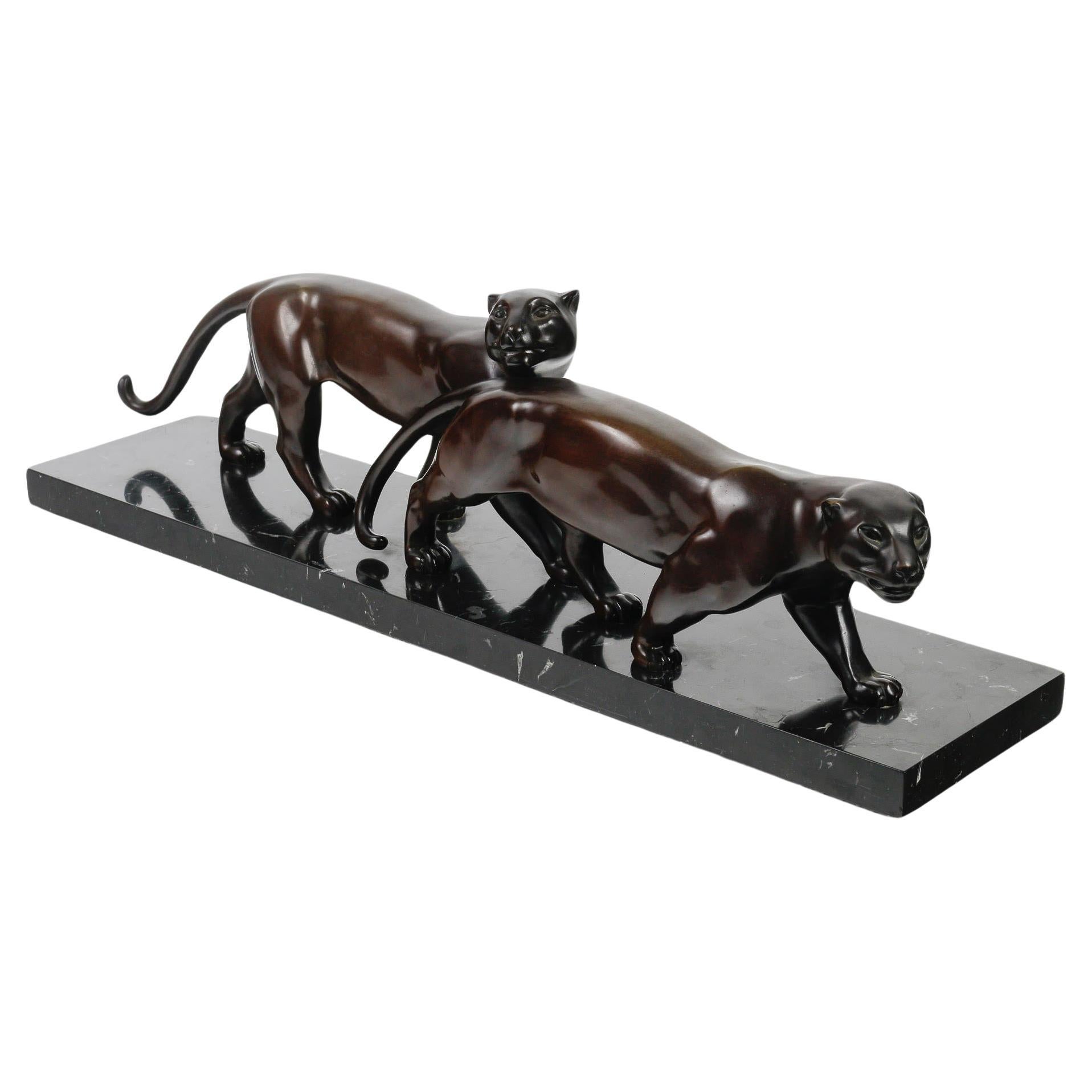 Pairs of Panthers in Patinated Bronze by Lucien Alliot.