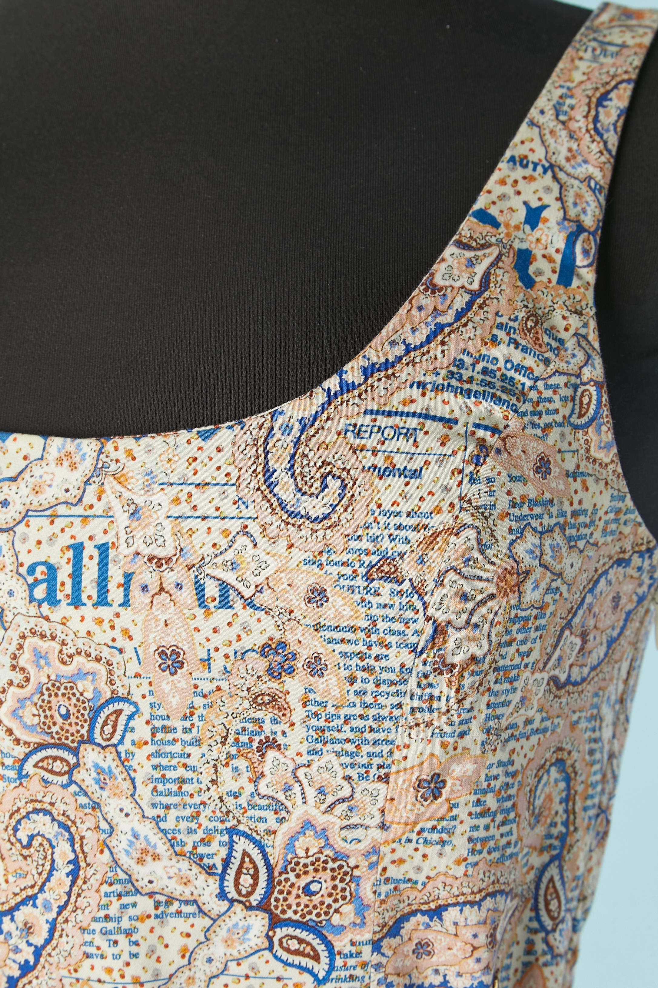 Paisley and Newspaper printed sleeveless cotton dress. Fabric composition: 97% cotton, 3% elastane. 
Zip closure on the lefts side. Belt covered with the same fabric, buckle closure and belt-loop. 
Authenticity hologram ( see picture) 
SIZE 40 (It)