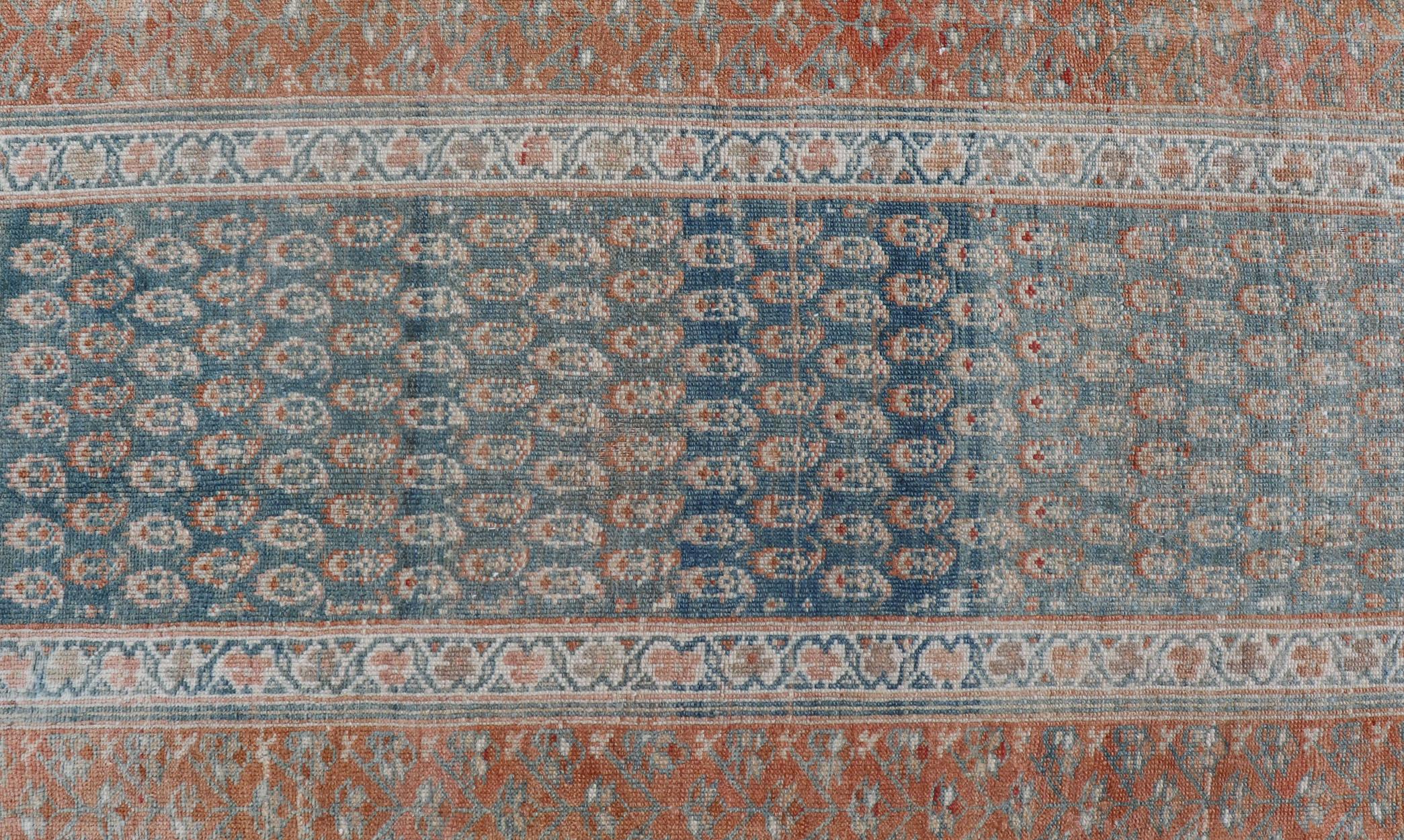 Hand-Knotted Paisley Field Antique Persian Kurdish Runner in Soft Teal Colors & Orange For Sale