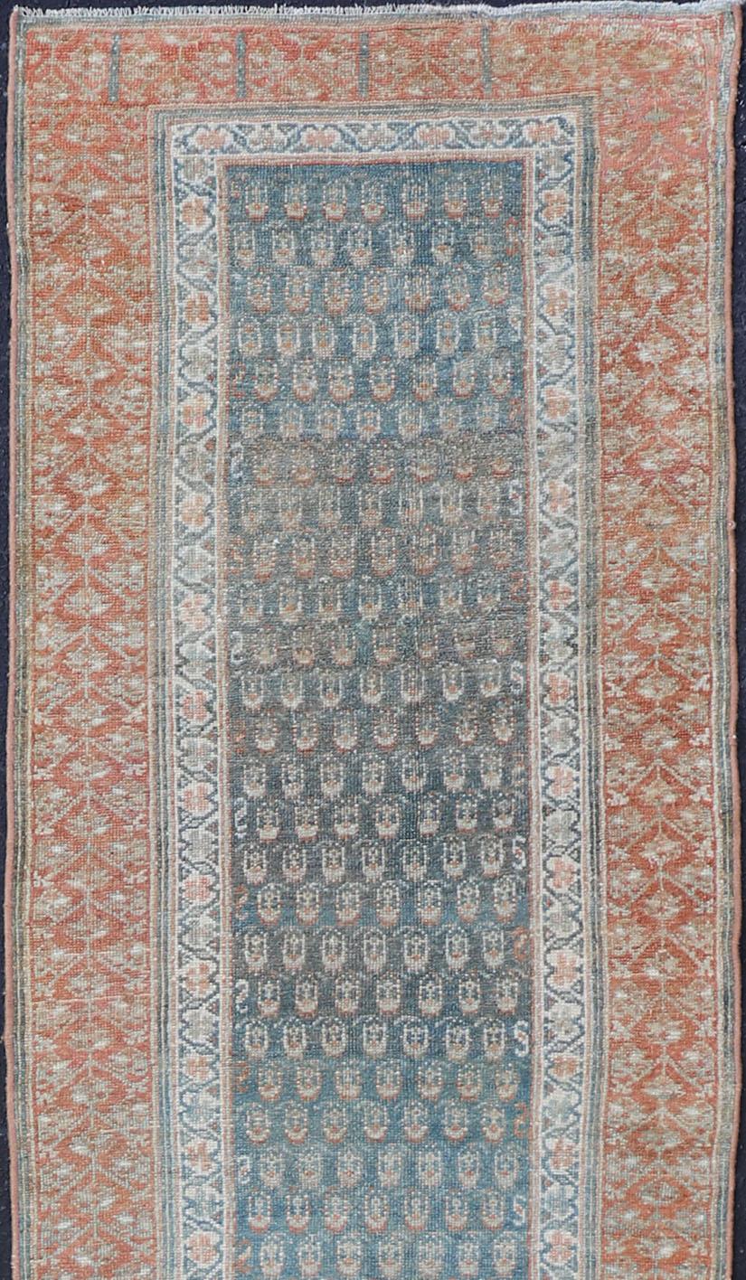 Paisley Field Antique Persian Kurdish Runner in Soft Teal Colors & Orange In Good Condition For Sale In Atlanta, GA