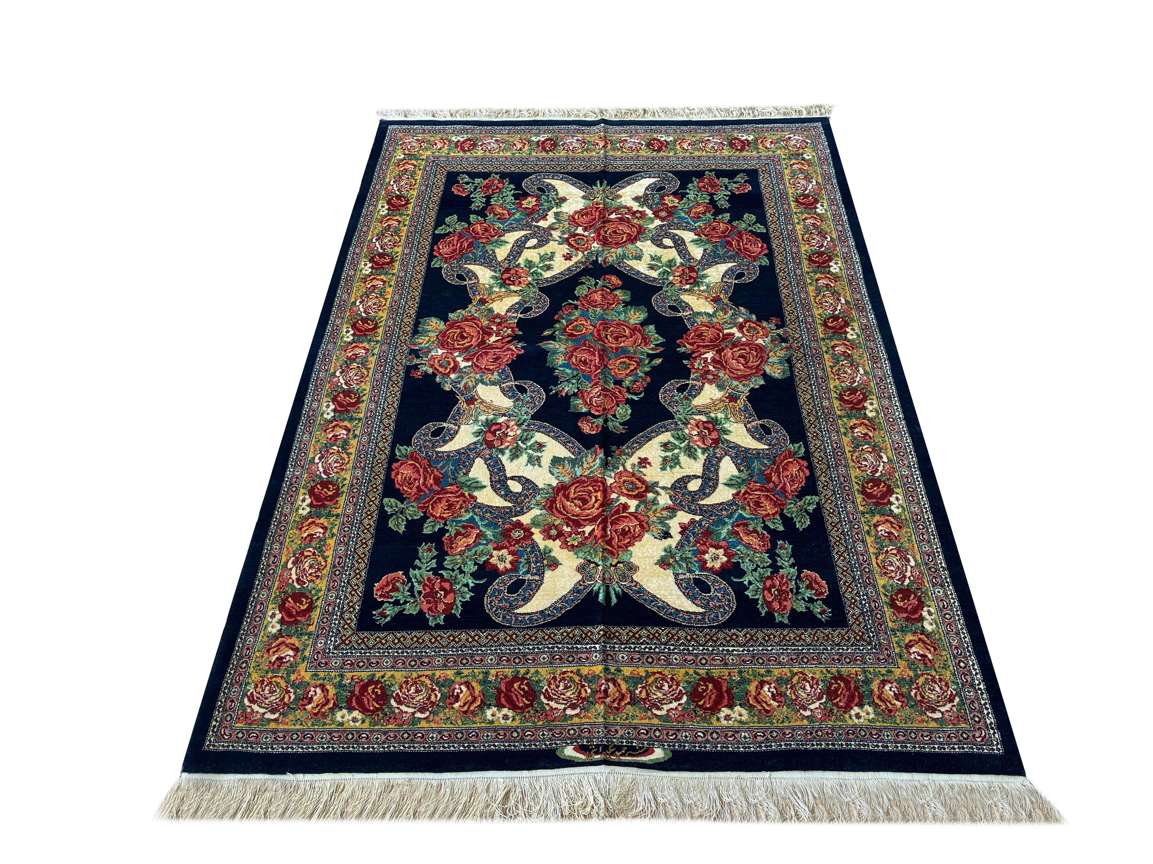 Exclusive magnificent handmade rug made of high-quality materials and designed by a very high-end rug workshop.
The background of this floral rug shows this glittery navy blue and cream rug as very vivid and shiny. 
The design of this rug includes