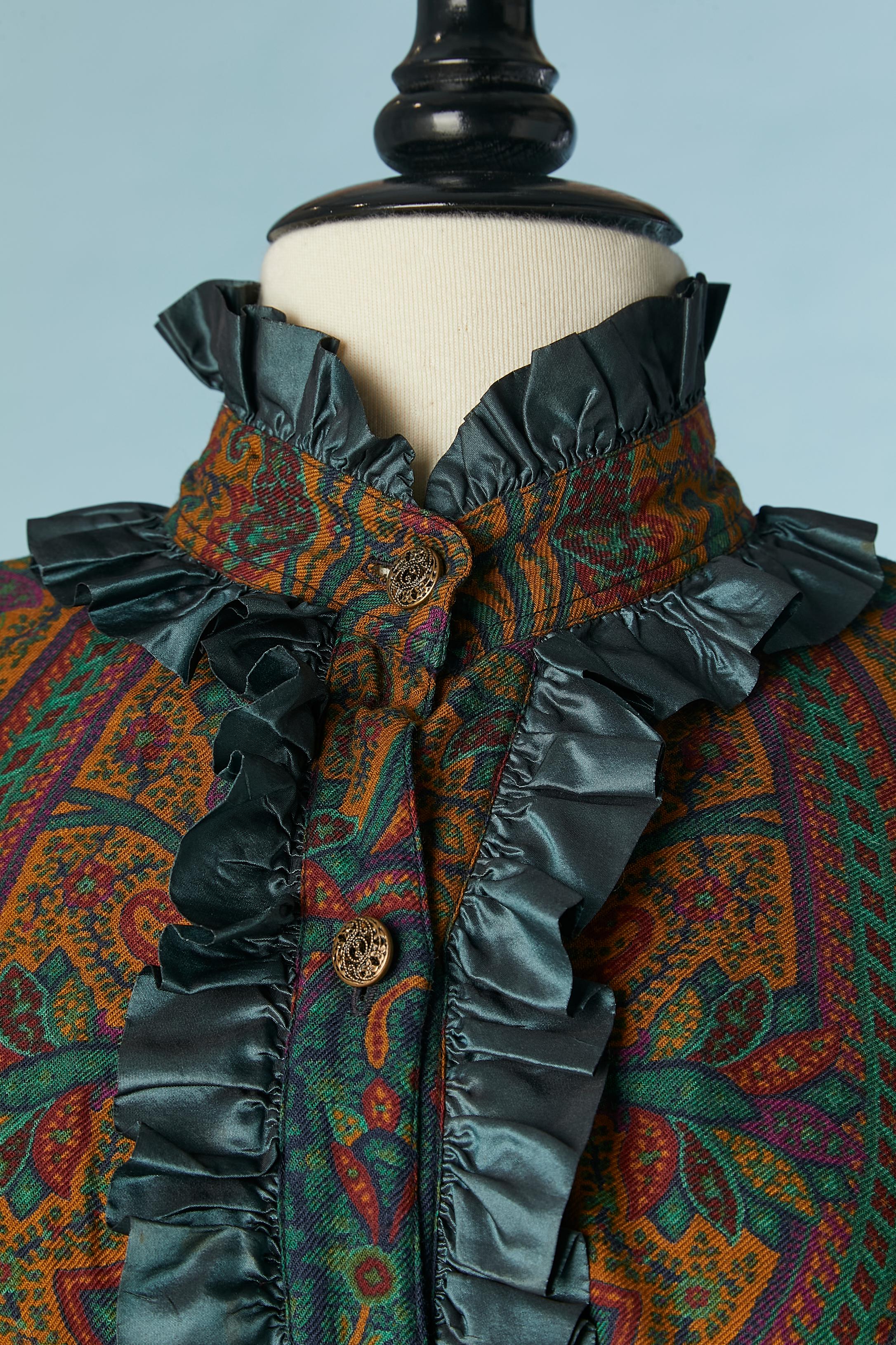 Paisley printed cotton shirt with taffetas ruffles. Jewellery buttons in the middle front and on the cuffs. 
SIZE 34 (Fr) S 