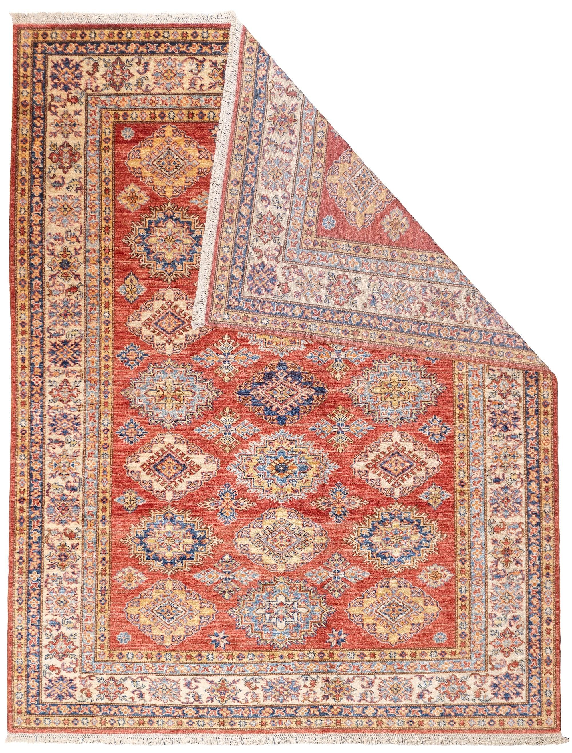 PAK Kazak Rug 5'10'' x 7'7''. Pakistani post-WWII rug, generally scatters, with soft wool and curvilinear Persianate designs. Synthetic dyes, cotton foundations. Moderate to medium weaves.