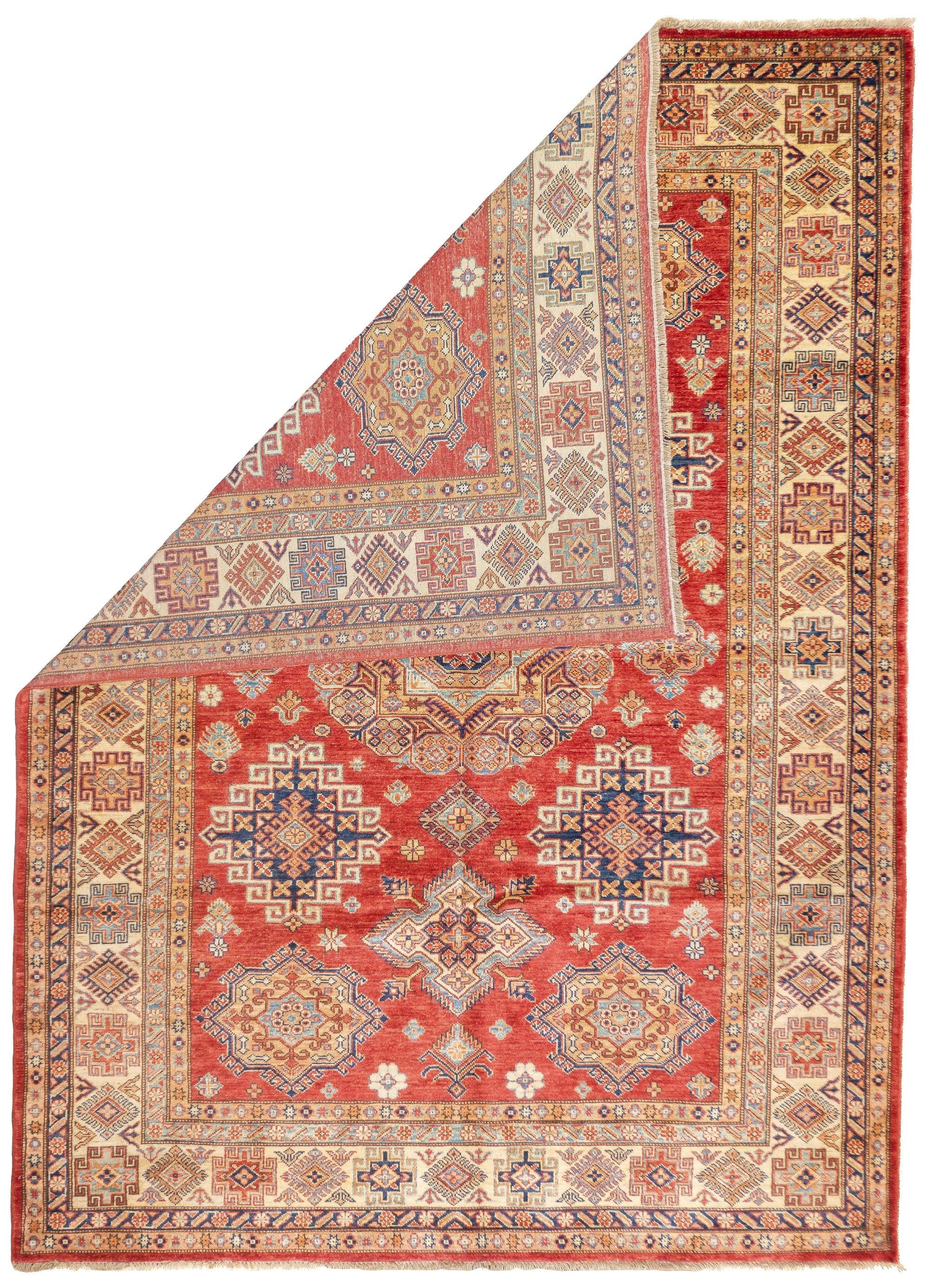 PAK Kazak Rug 5'8'' x 7'10''. Pakistani post-WWII rug, generally scatters, with soft wool and curvilinear Persianate designs. Synthetic dyes, cotton foundations. Moderate to medium weaves.