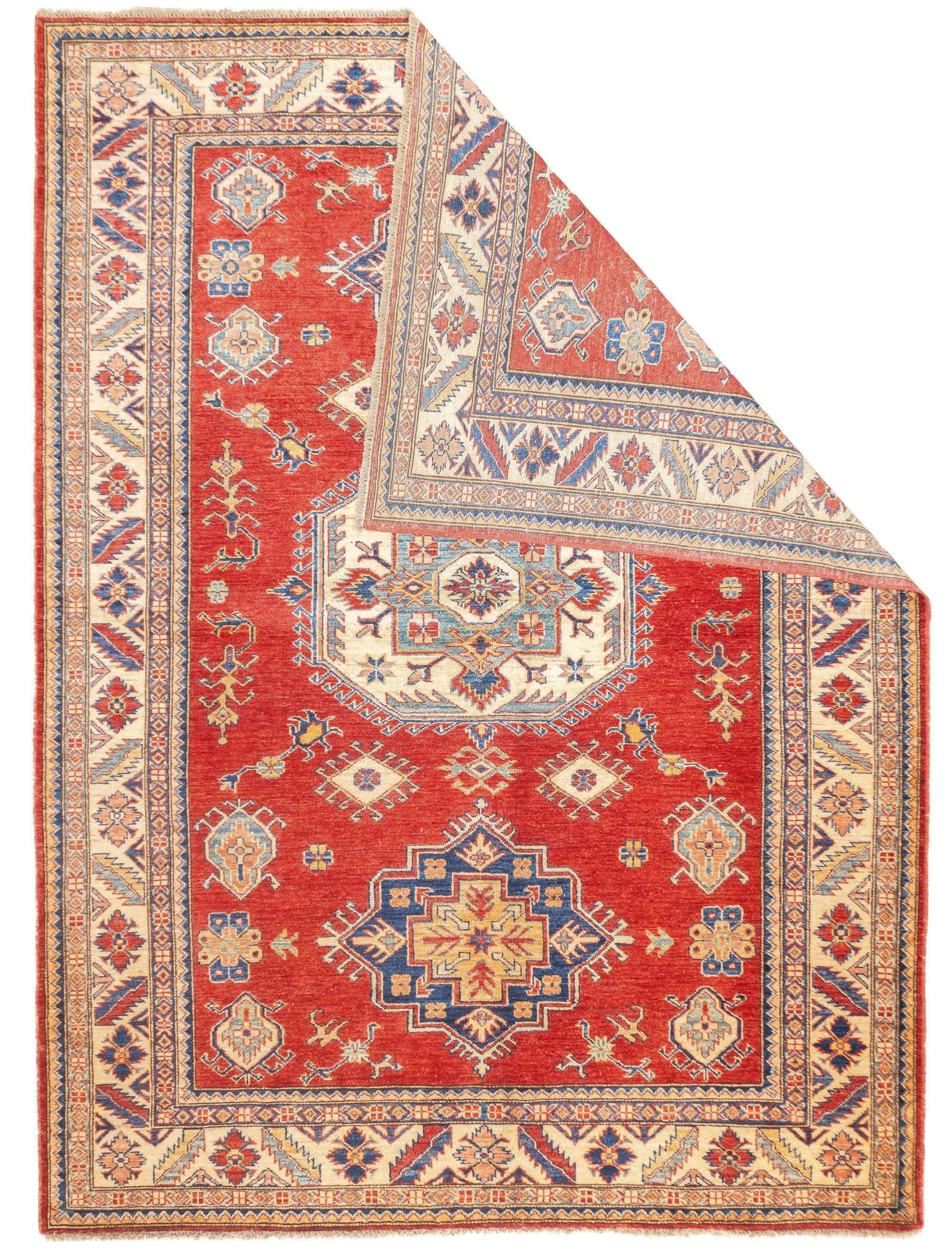PAK Kazak Rug 5'9'' x 7'10''. Pakistani post-WWII rug, generally scatters, with soft wool and curvilinear Persianate designs. Synthetic dyes, cotton foundations. Moderate to medium weaves.