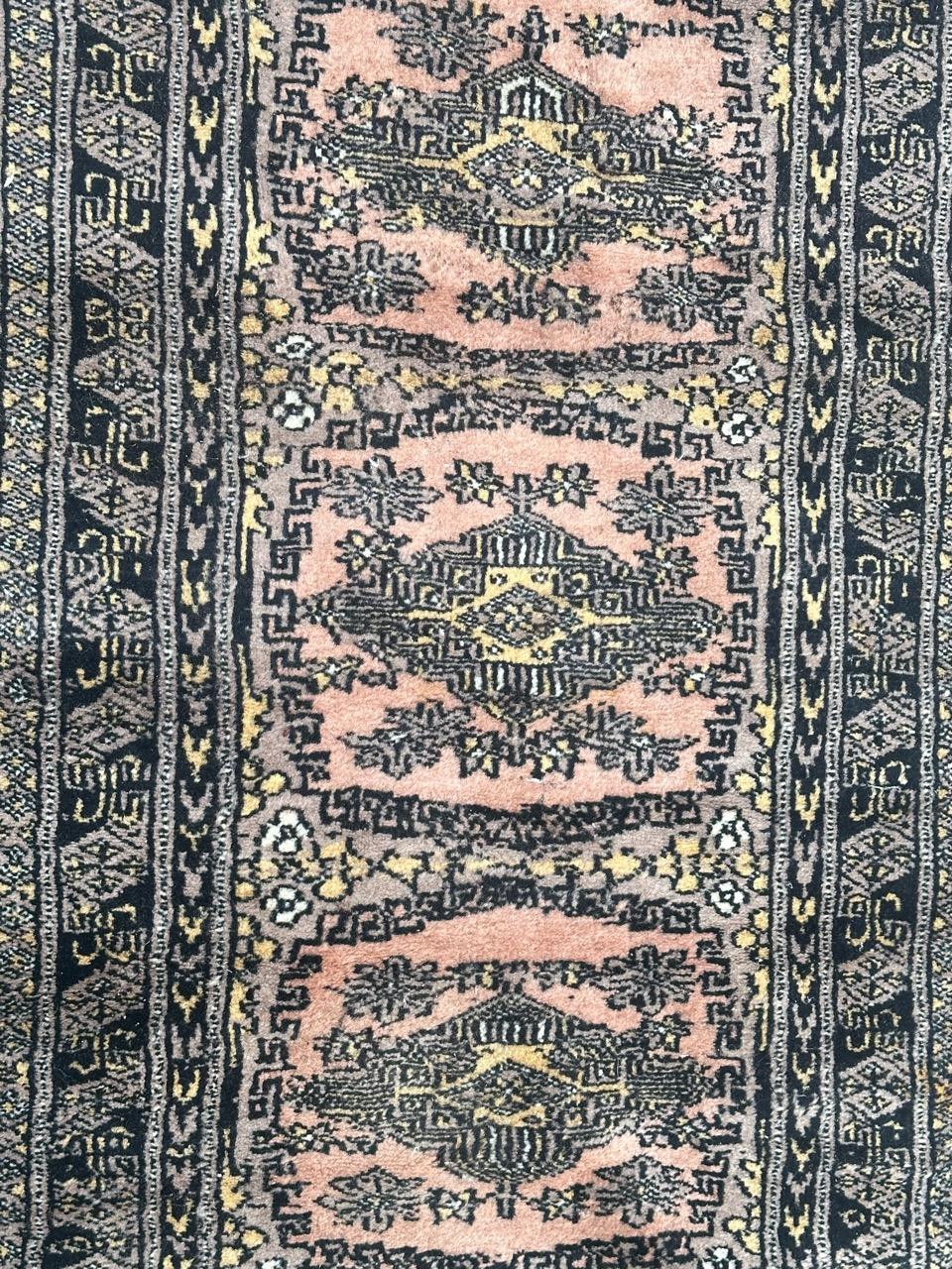 Pretty small vintage Pakistani rug with nice geometrical design in style of Turkmen rugs, and beautiful colours with pink, grey, yellow and black, entirely and finely hand knotted with wool on cotton foundation.

✨✨✨
