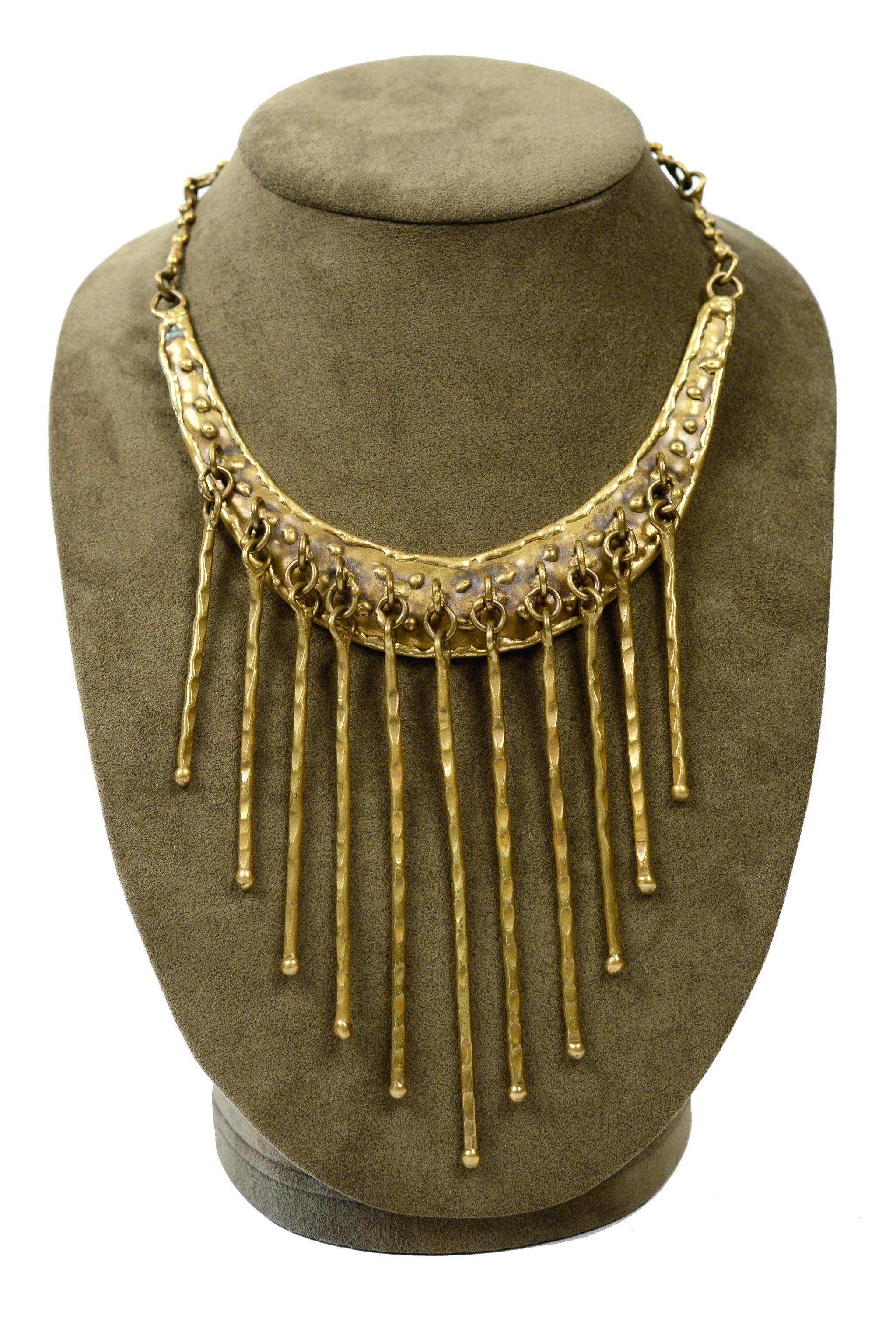 Resurrection Vintage is excited to offer a vintage Pal Kepenyes brutalist bronze metal collar necklace with a handmade chain, metal loops, and hammered fringe.

Pal Kepenyes
One Size
Handmade
Metal
Excellent Vintage Condition
Authenticity Guaranteed 