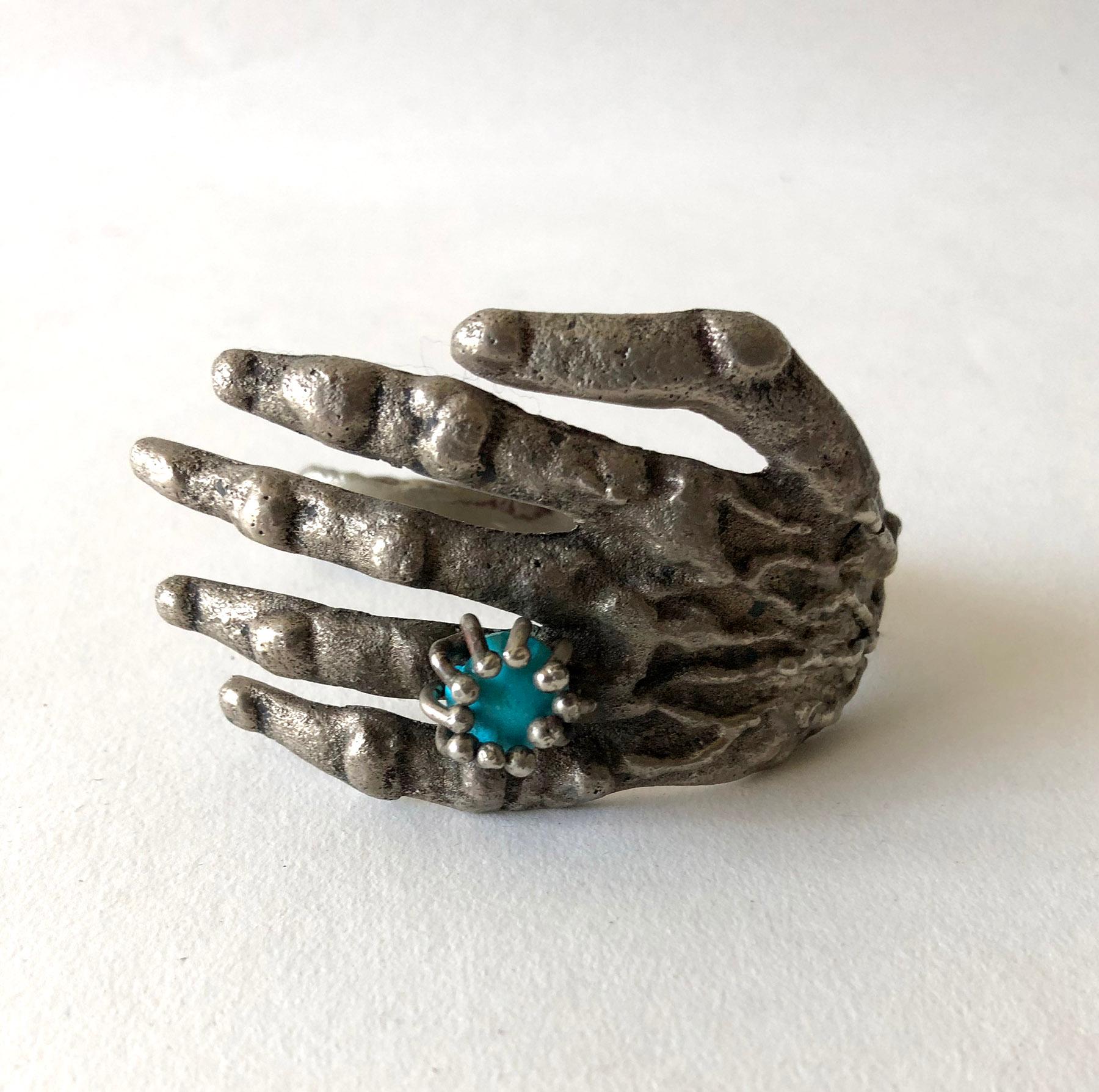 Surrealist bronze hand cuff bracelet with turquoise ring decoration created by Pal Kepenyes of Acapulco, Mexico.  Bracelet measures 2.5