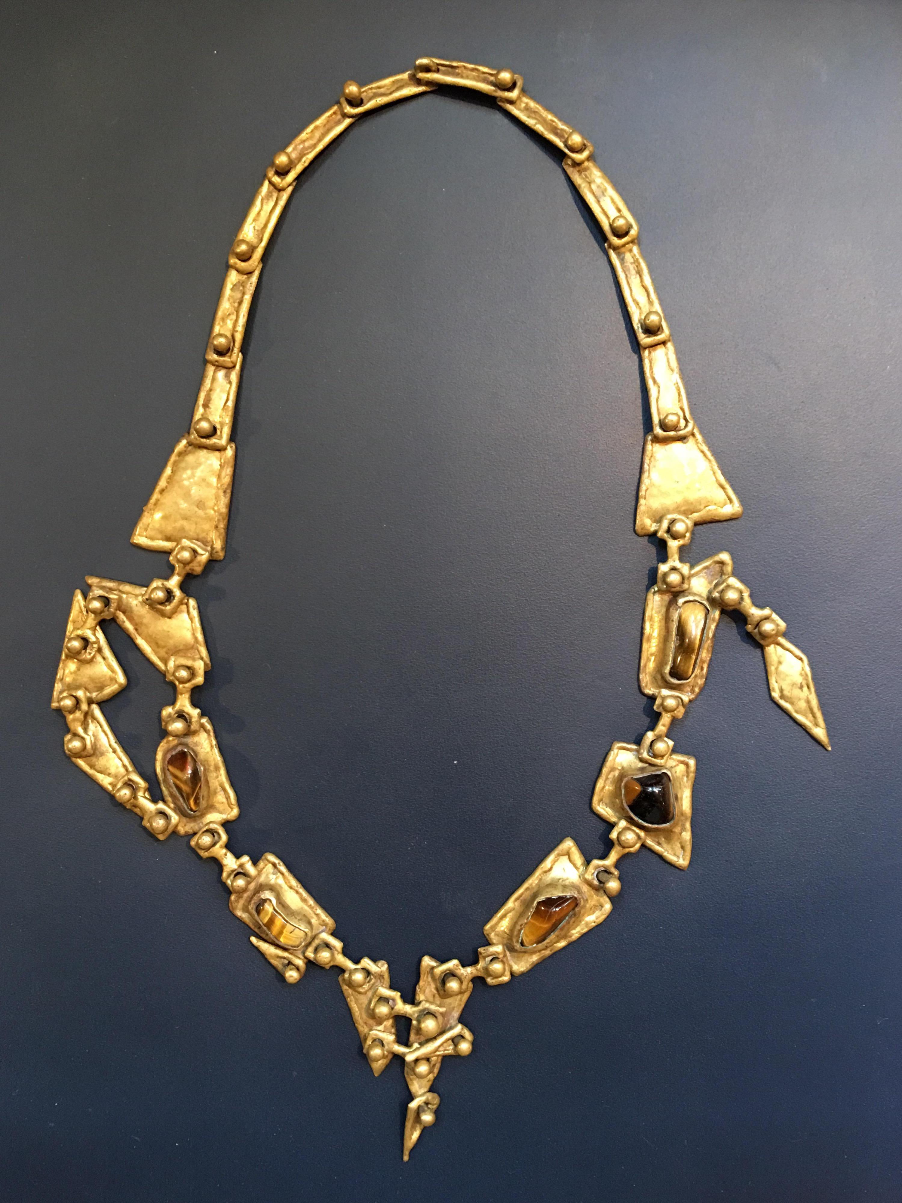 Pal Kepenyes brutalist bronze segmented necklace with polished stones. Necklace is held together with hand riveted connectors. Signed on the back. 