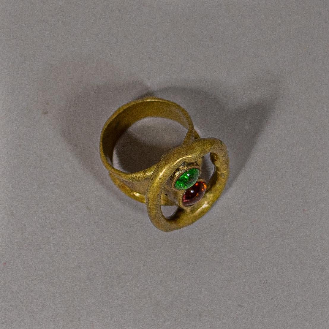 A ca. 1980 Brutalist bronze ring by Hungarian-born Mexican artist Pal Kepenyes. The ring shows an oval with 2 resin cabochons. Unsigned.

Weight: 11 g.
Size: 6 (16.45 mm. Ø)