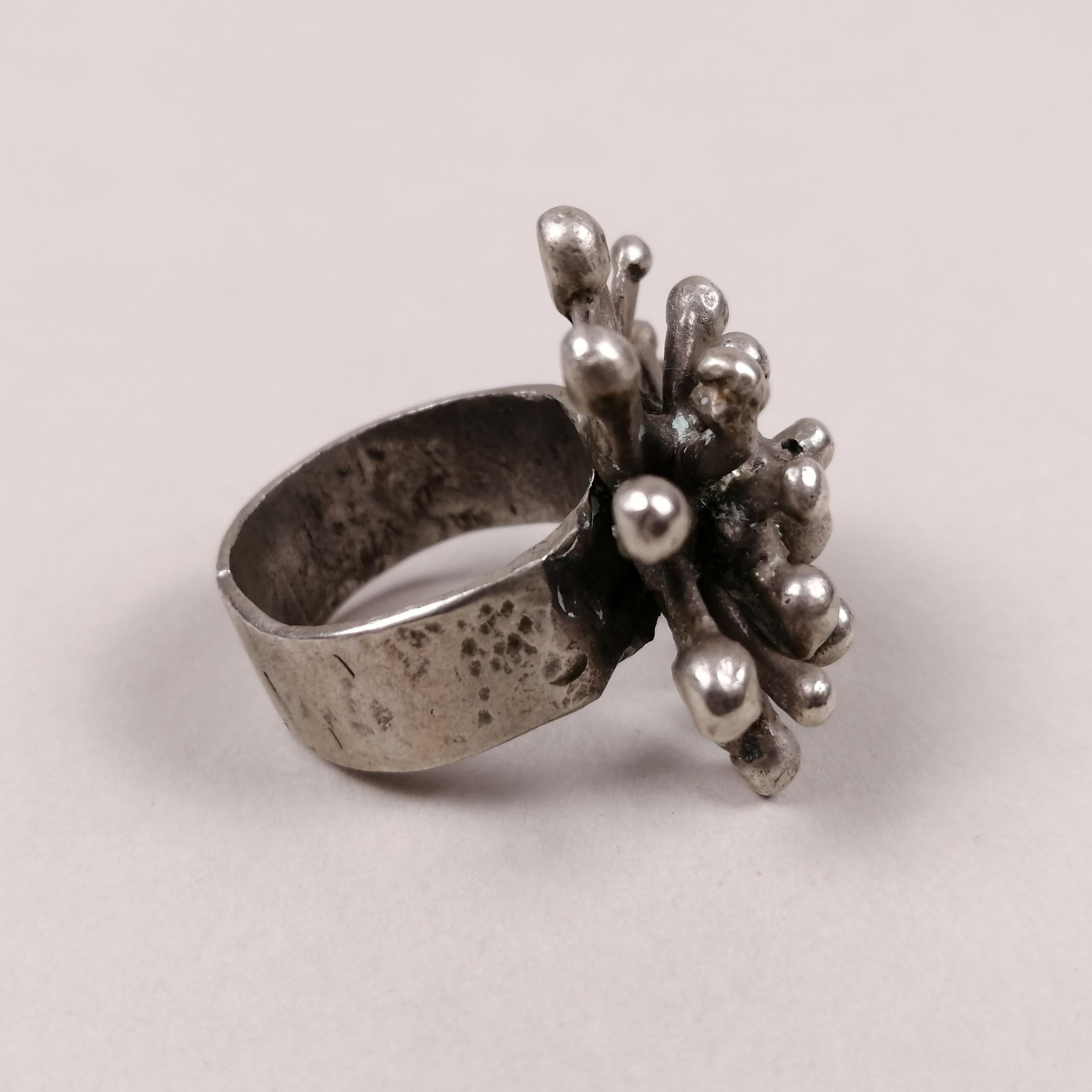 A Brutalist nickel silver ring by Hungarian-born Mexican artist Pal Kepenyes. The 