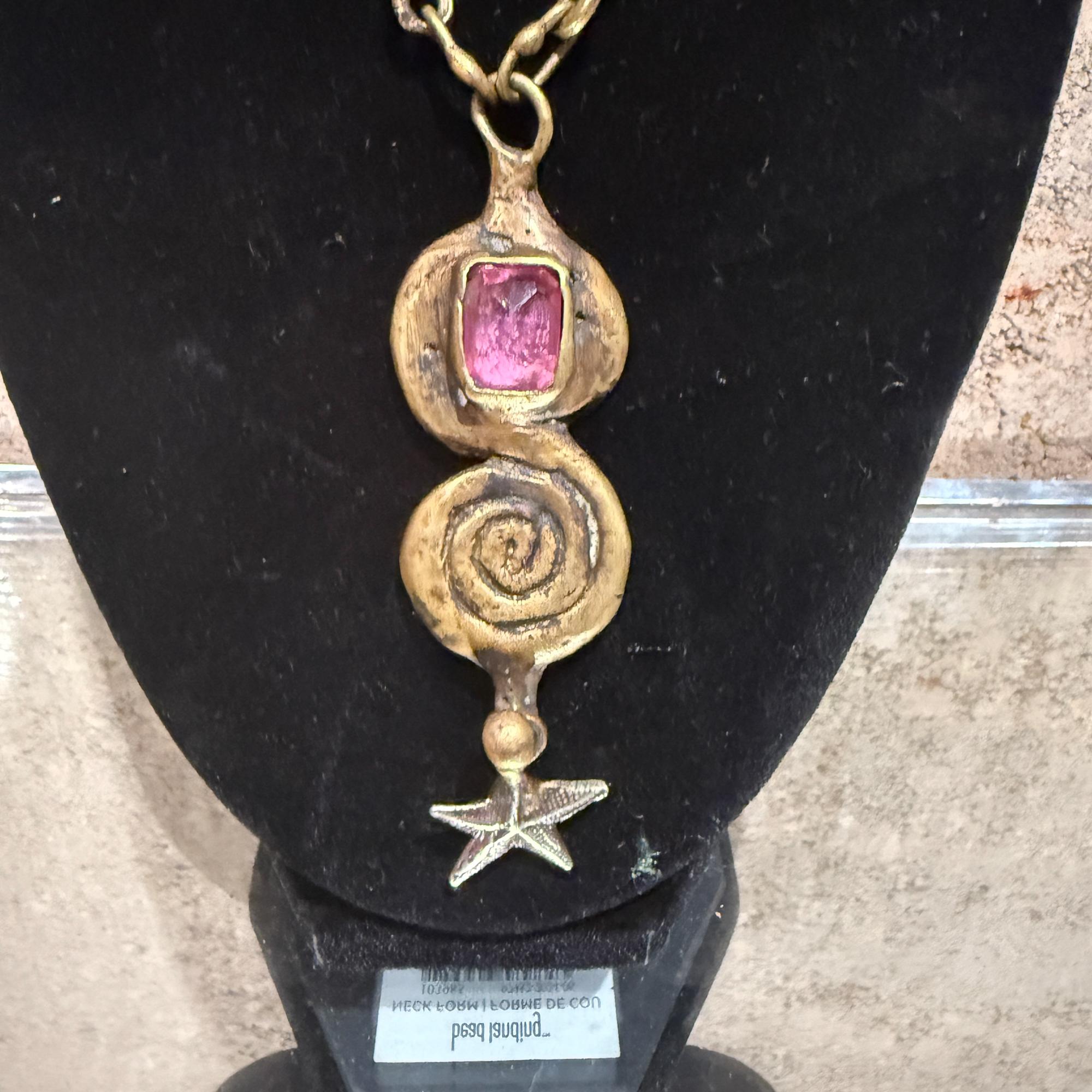 For your consideration, a vintage choker  or necklace designed and signed by Pal Kepenyes.  Brutalist mid-century modern period. Mexico circa the 1970s. Unique designing brass with pink translucent stone, it appears to be a Scapolite