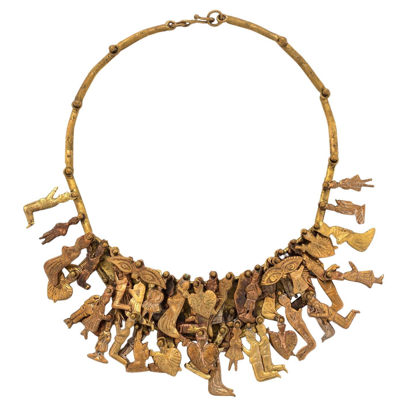 Pal Kepenyes ”Milagros” Necklace with Praying Figures in Brass and Copper For Sale