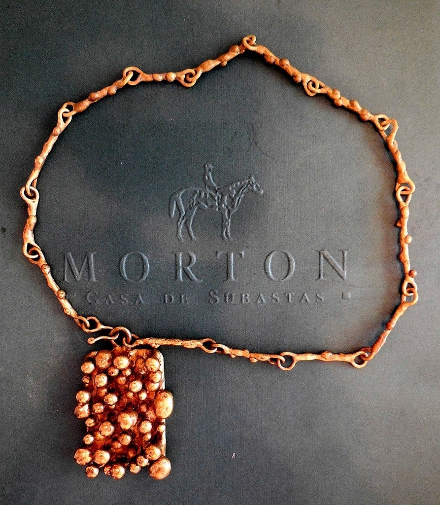 
Chain measures 19.5 inches in length
Pendant measures 2.4 X 1.5 X .5 inches

Pal Kepenyes is a sculptor and researcher of Hungarian art, whose artistic production includes sculptures of small and medium format, jewelry and miniature decorative