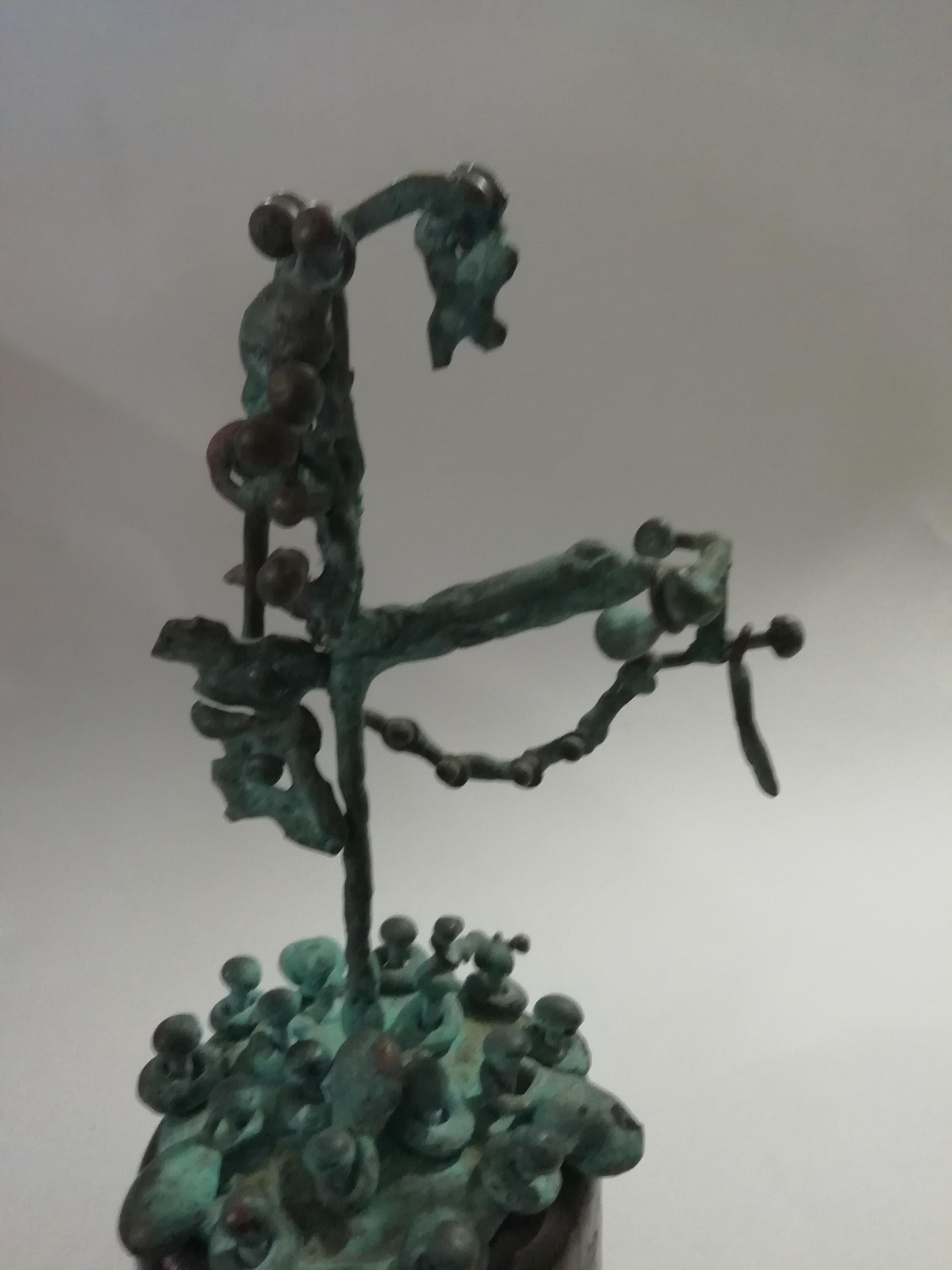 A rare Brutalist style Kinetic sculpture by Hungarian-born Mexican artist Pal Kepenyes. The organic design depicts a tree over a wood base. No signature.

A sculptor from Hungary who was nationalized Mexican, Pal Kepenyes resides in Acapulco where