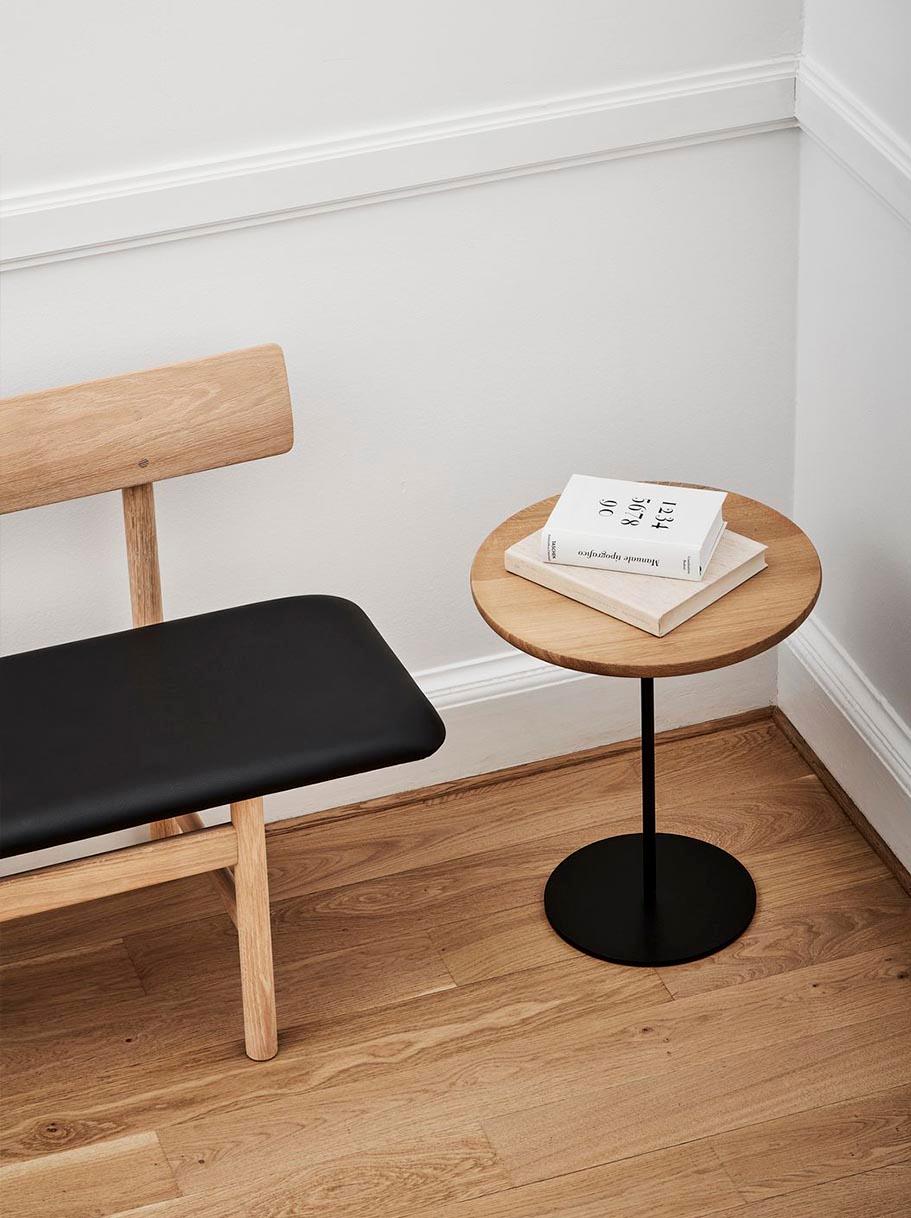 Pal is there whenever you need it. It’s a small, occasional table that’s movable and easy to access. 
Pal’s solid wood table top is crafted to resemble a serving tray and a slim stem elevated by a slim stem in stainless steel or powder-coated
