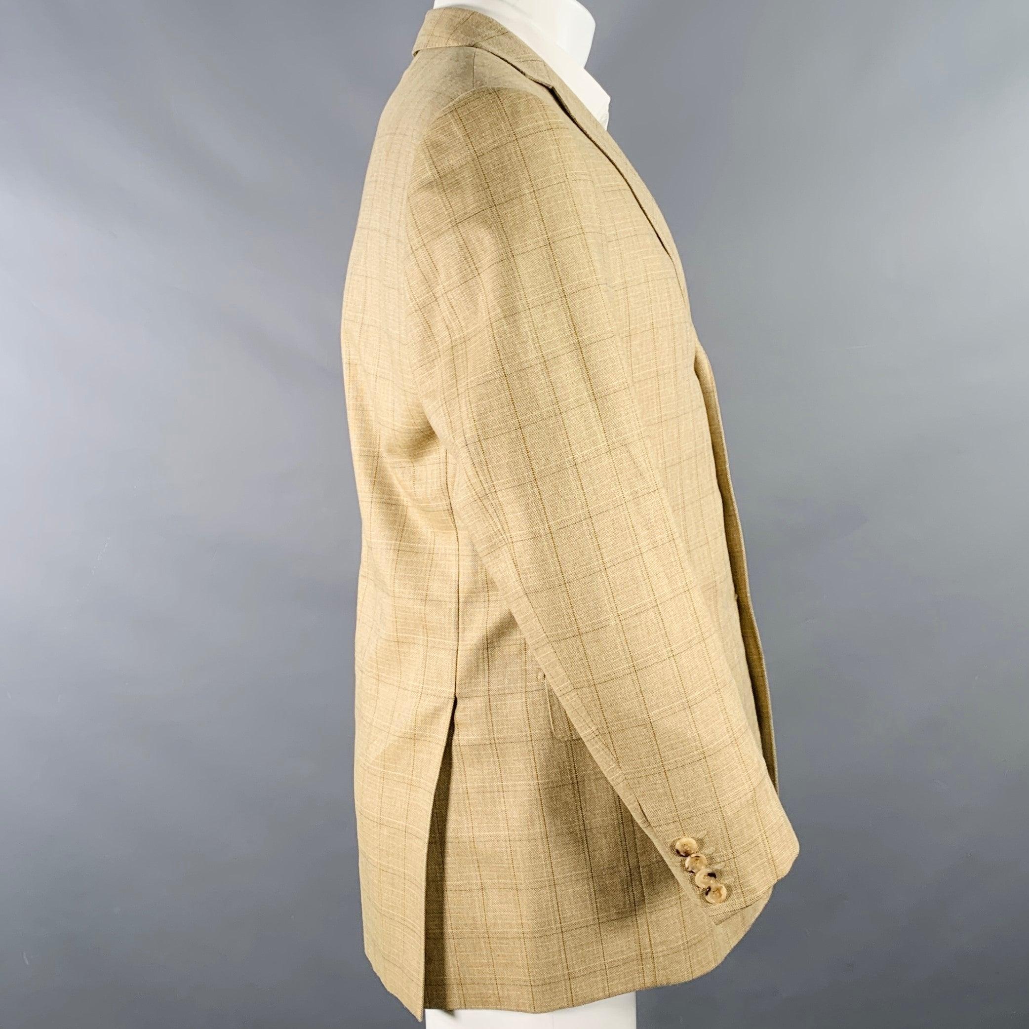 PAL ZILERI sport coat
in a beige, grey, and brown silk wool blend fabric featuring a window pane pattern, notch lapel, double vented back, and three button closure. Made in Italy.Very Good Pre-Owned Condition. Multiple marks on sleeve. 

Marked:  