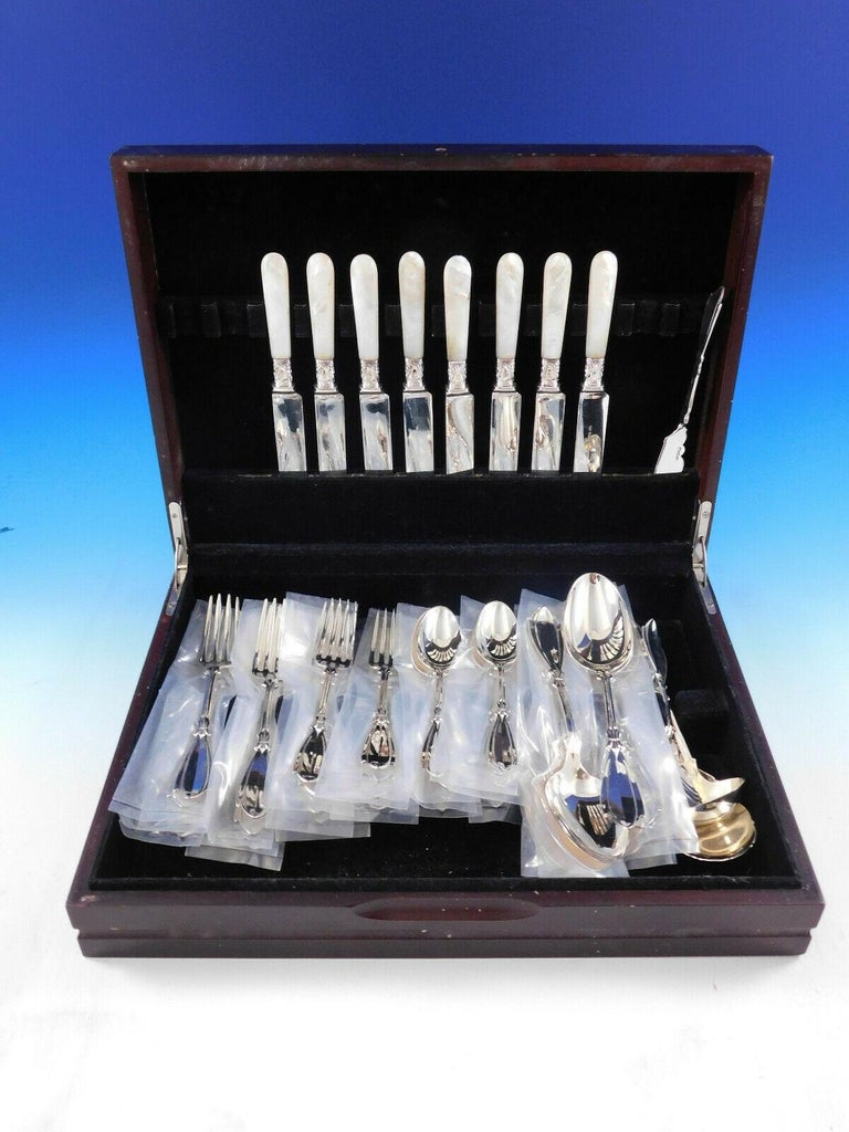 Exceedingly rare early Palace by Coles - Shiebler, circa 1850, sterling silver Flatware set - 44 pieces (including Mother of Pearl Knives). This set includes:


8 knives, mother of pearl handle, 8 1/2