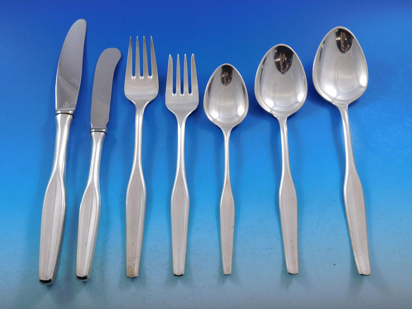 S. Christian Fogh, a Danish silversmith, operated a workshop in Copenhagen, Denmark, from 1947-1973. He was known for his unique jewelry and flatware creations.

Palace by Fogh of Denmark, circa 1950, Sterling Silver Flatware set - 88 pieces. This