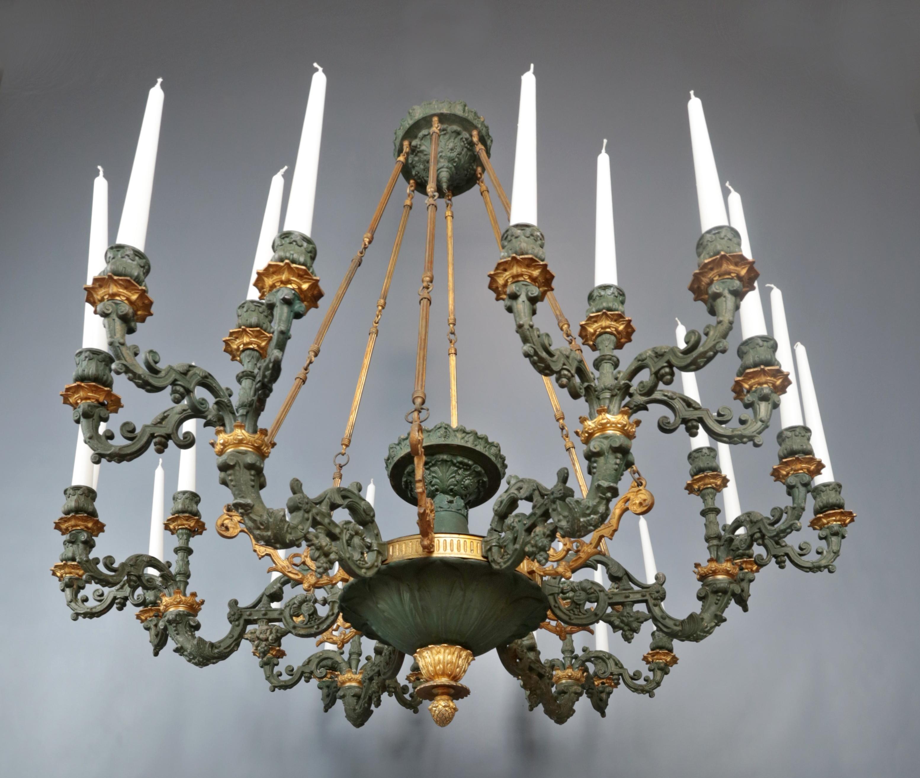 Palace French Empire Chandelier 24 Candles

A large and heavy chandelier from the 19th century in the Empire style. An elegant palatial chandelier that can be used with candles or electrified, the chandelier is originally candle, was electrified in