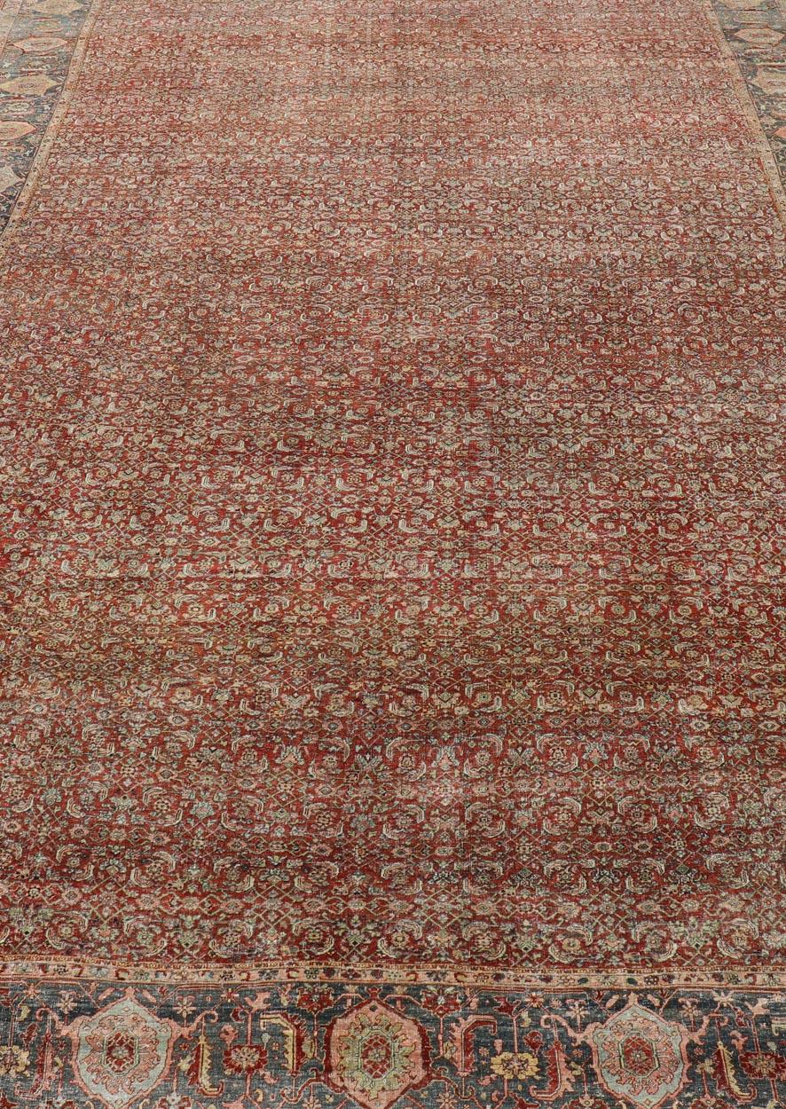 Hand-Knotted Palace Size Antique Persian Bidjar Rug in Shades of Red, Blue Grey & Lime Green For Sale
