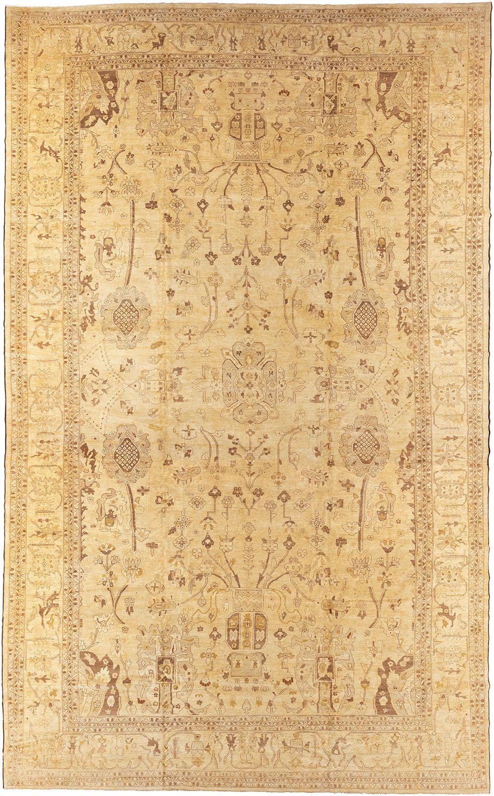 Palace size hand-knotted wool 100 % dyed early 21st century Pishawar rug in yellow and brown.

Measures: 15'1'' x 24'5''.