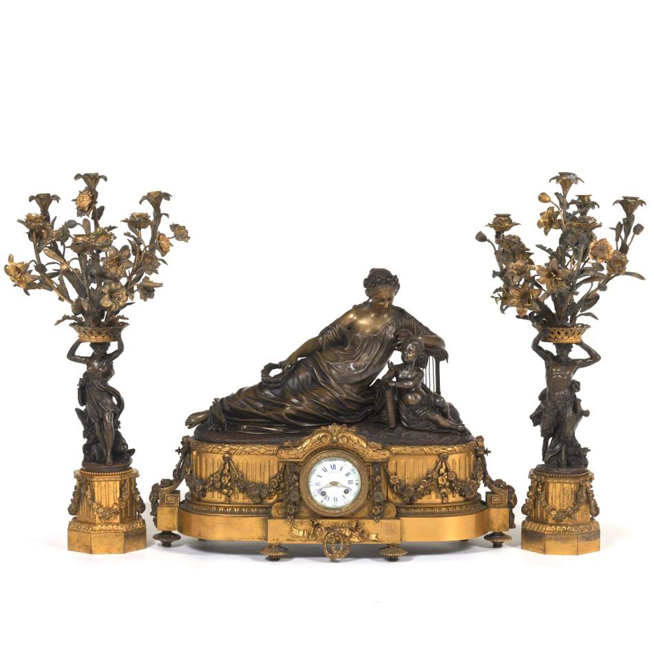 Palace size French 19 century Louis XVI style Raingo Freres two tone patinated and gilt bronze Figural Mantle Clock and Candelabras.