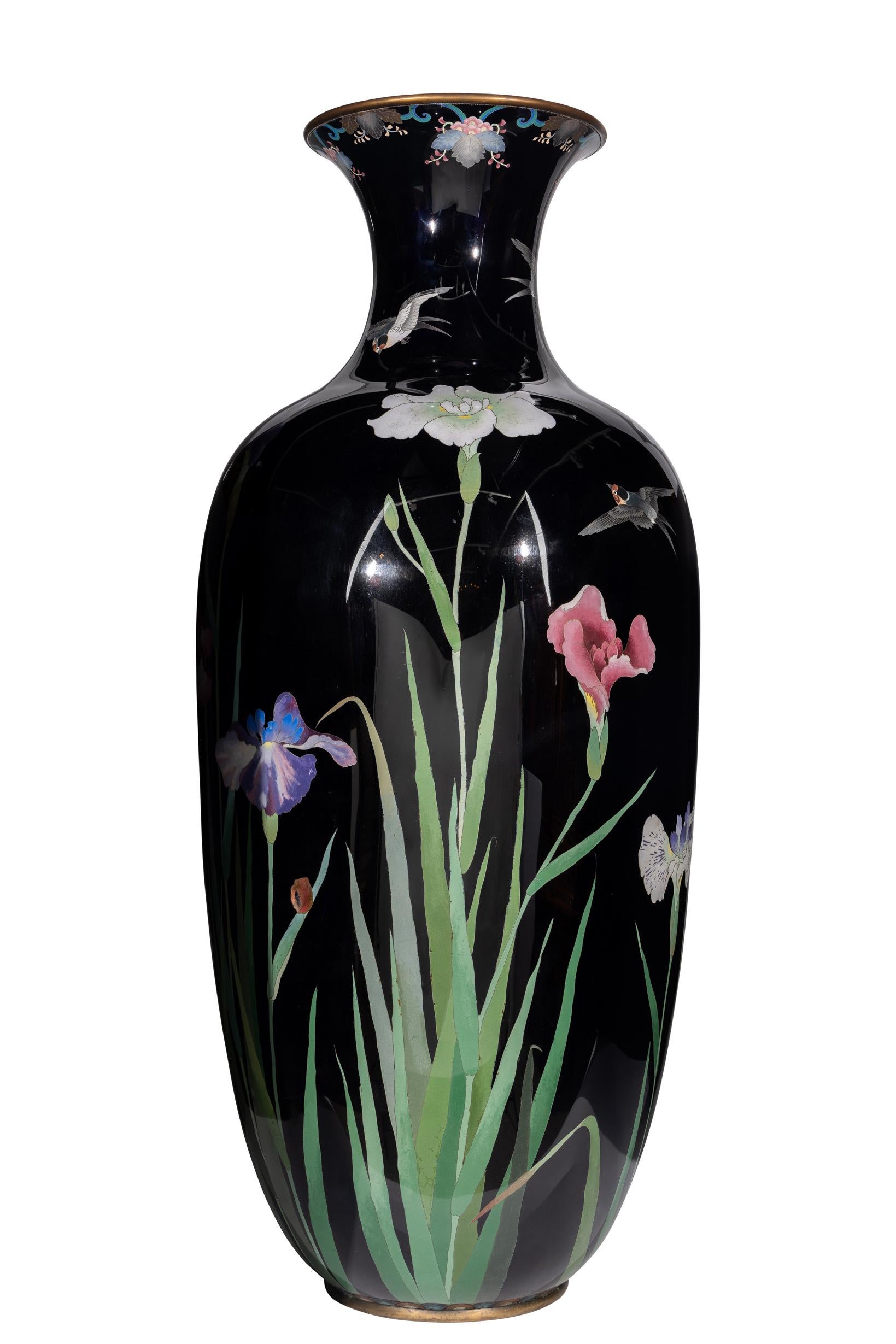Introducing a truly magnificent Palace-Sized Japanese Cloisonné Enamel Vase adorned with exquisite irises and graceful sparrows. This extraordinary vase showcases the epitome of Japanese cloisonné craftsmanship, capturing the essence of nature's