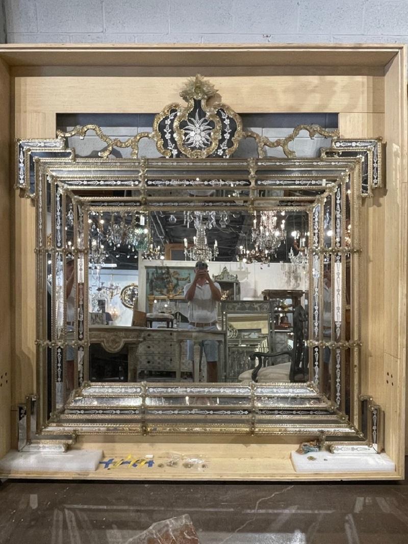 Incredible palace size etched glass Venetian mirror. Circa 1980. This stunning mirror is sure to make a statement. Restorations will be made before shipping.