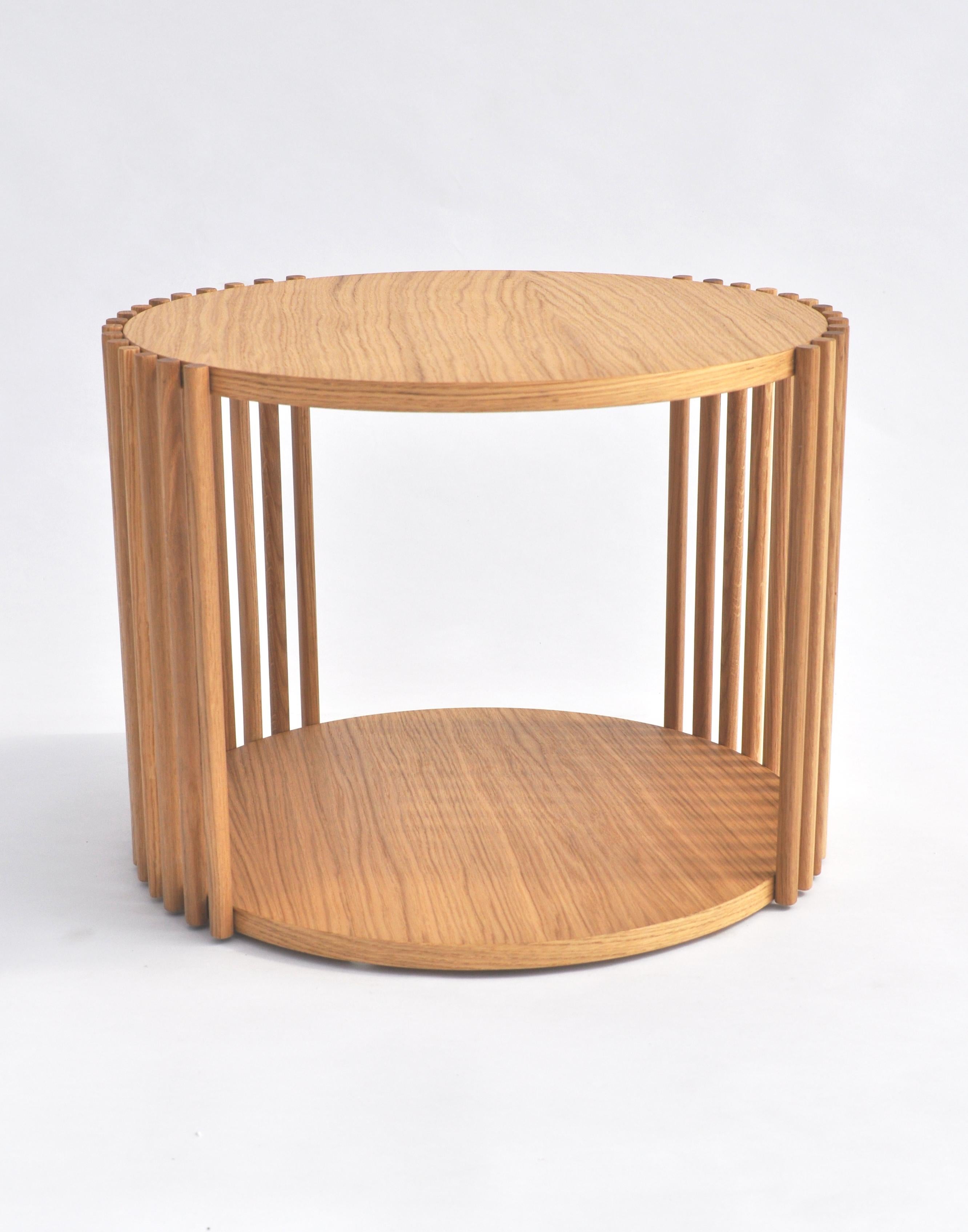 Coffee table from the Palafitte collection, made up of solid wood strips that support the veneered Oak tops.
Diameter Ø53xh.40cm.
Venice, the floating city, with its urban system based on a myriad of poles immersed in the water, provides the