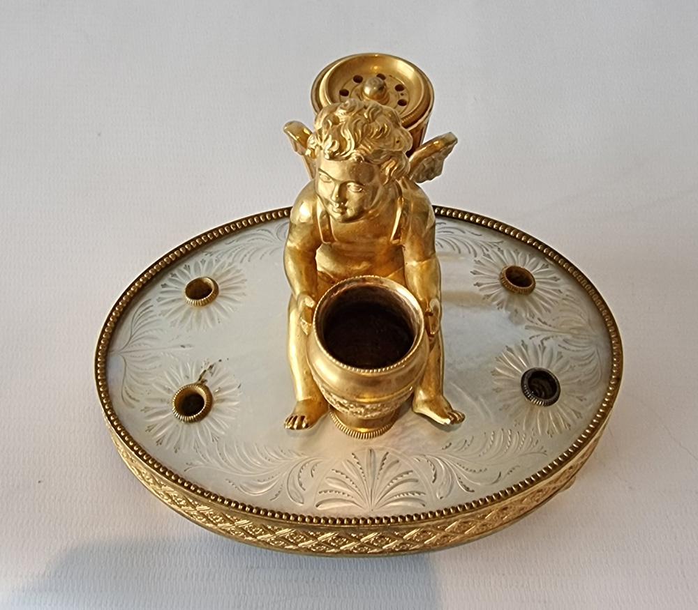 Mid-19th Century Palais Royal Engraved Mother of Pearl and Ormolu Cupid Inkwell For Sale