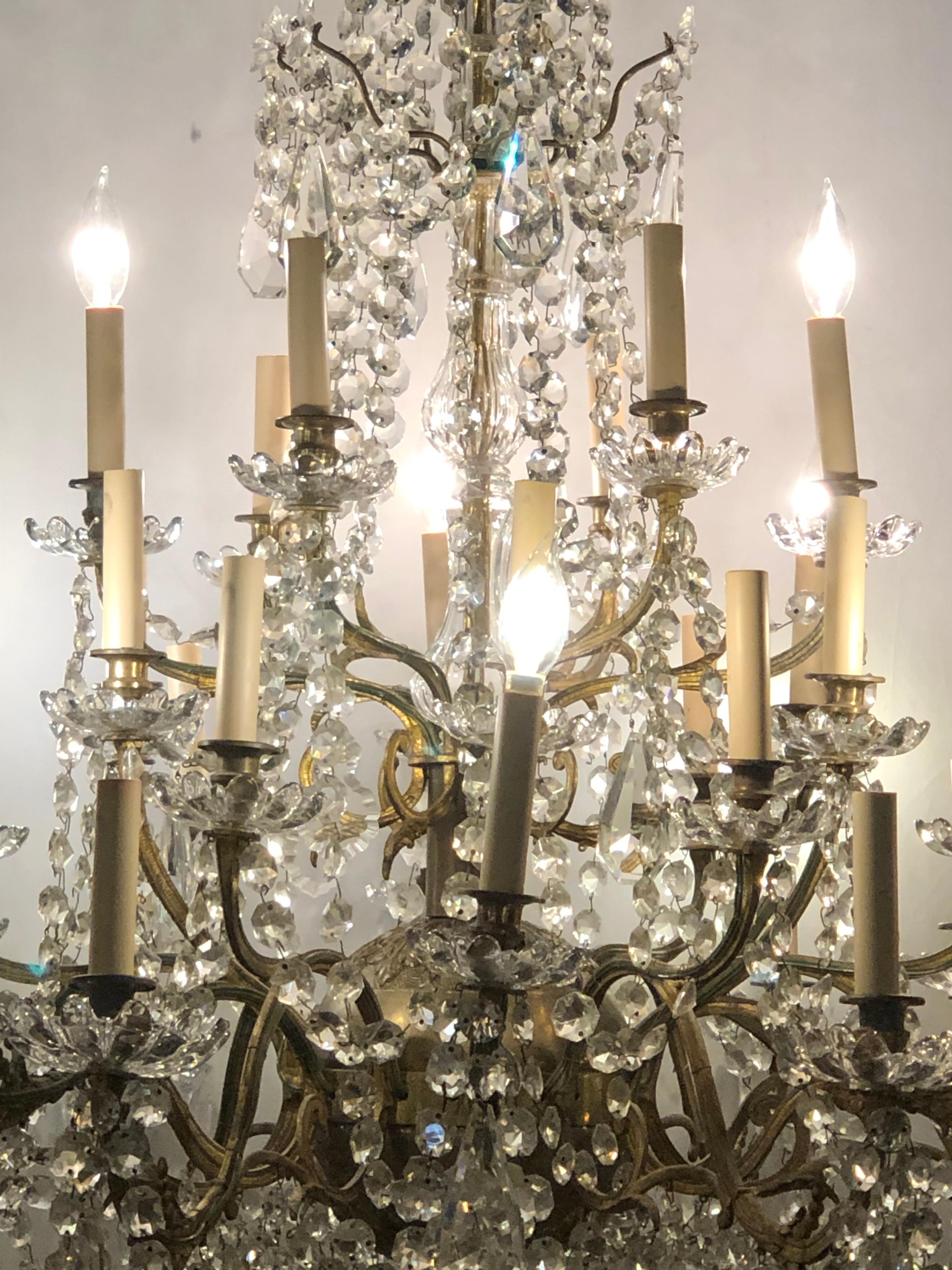 French Palatial 19th-20th Century Thirty-Light Crystal and Brass Column Form Chandelier For Sale