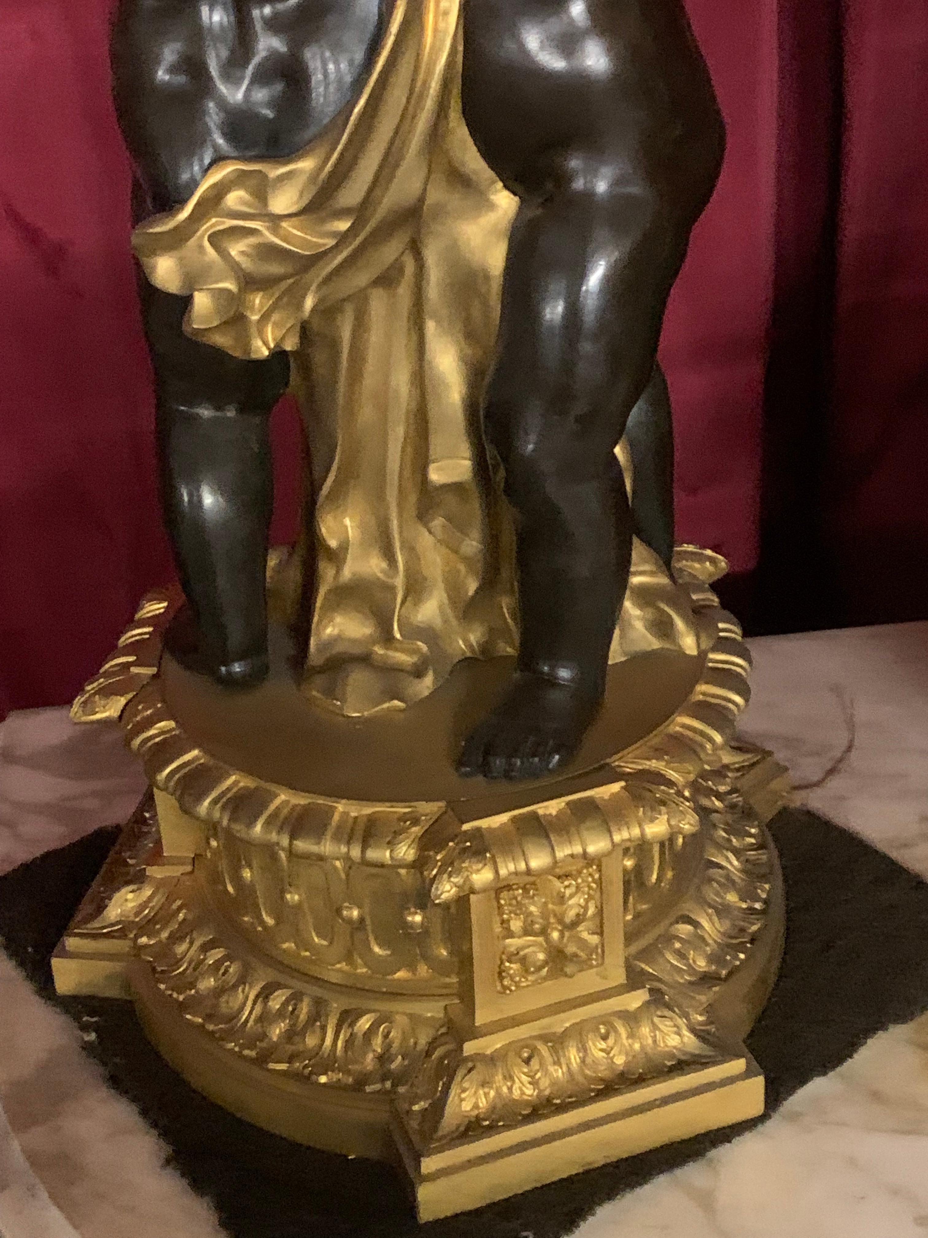 palatial  3 pieces clock set in bronze with cherub In Good Condition For Sale In Los Angeles, CA