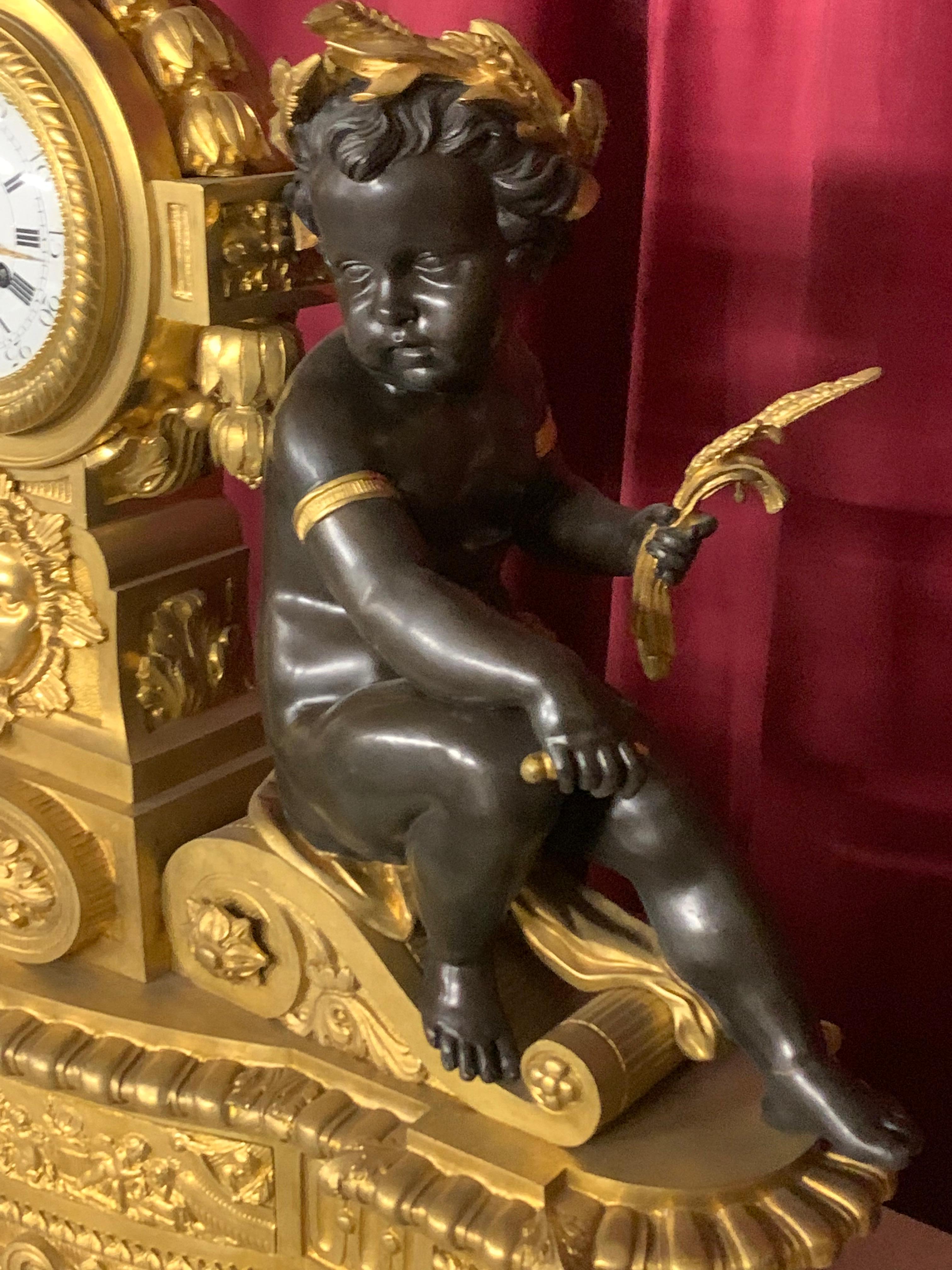 Late 19th Century palatial  3 pieces clock set in bronze with cherub For Sale