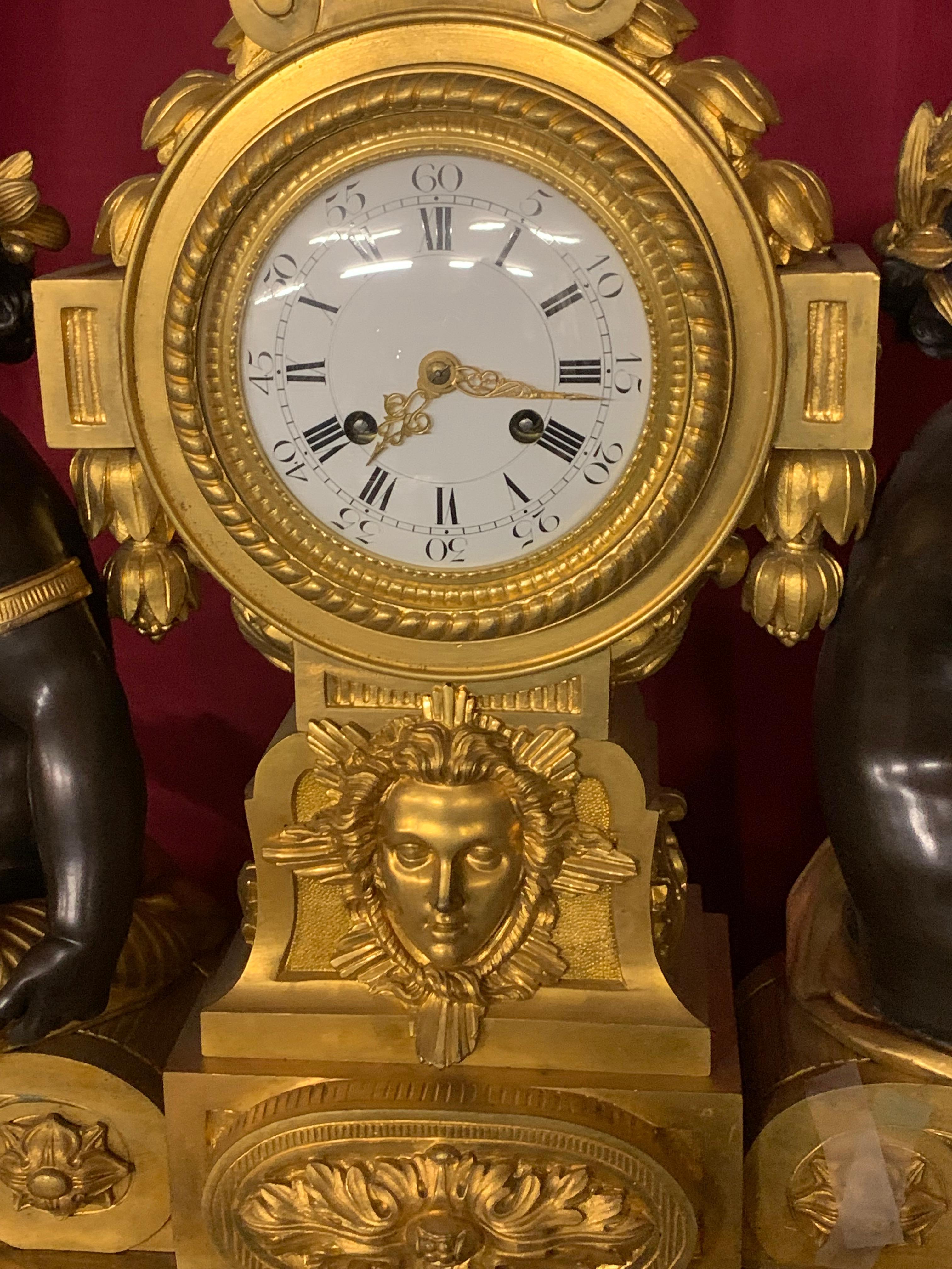 palatial  3 pieces clock set in bronze with cherub For Sale 1