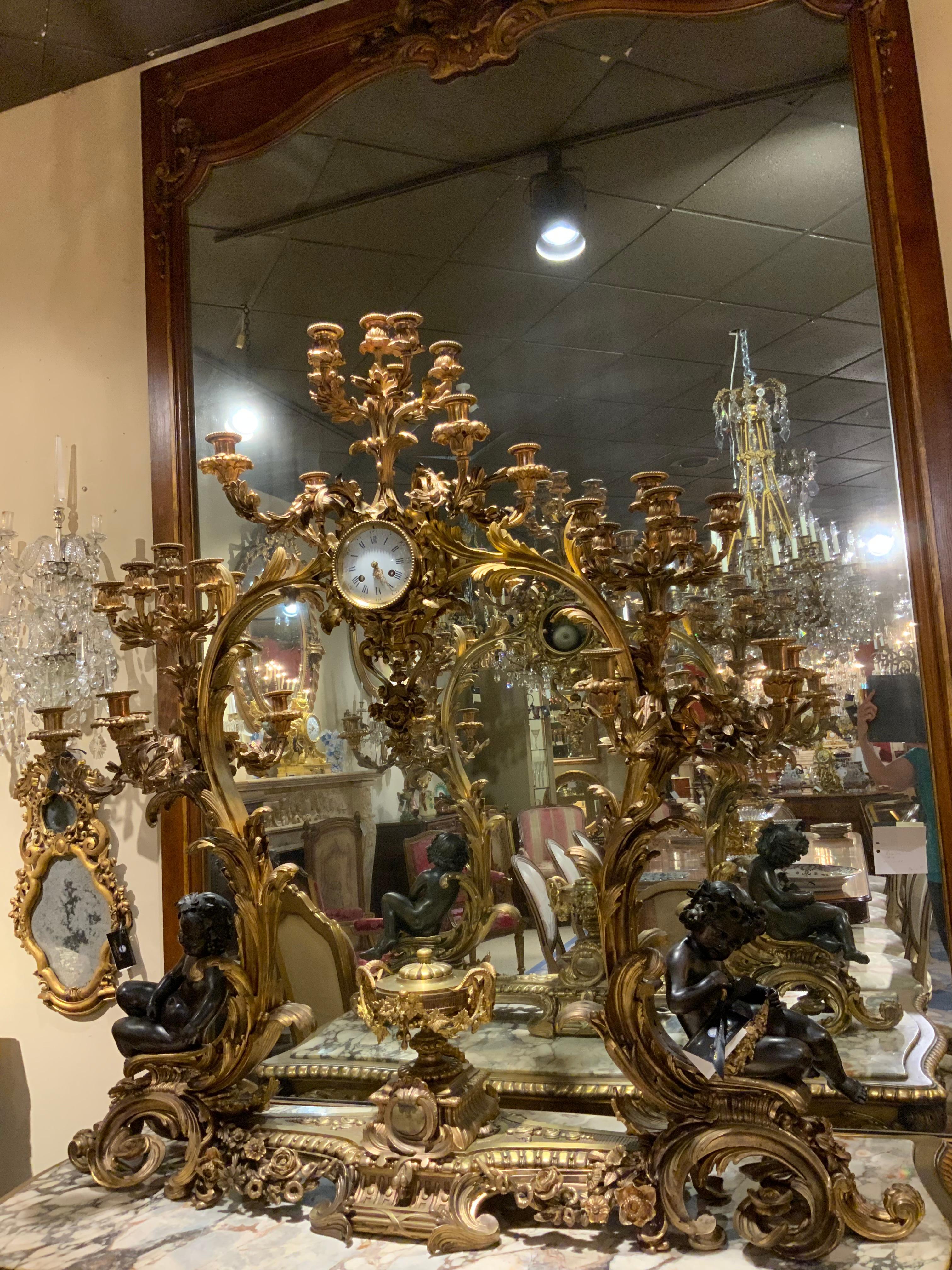 Gilt Bronze Doré and Patinated  French Clock with 26 Candelabrum with putti 11