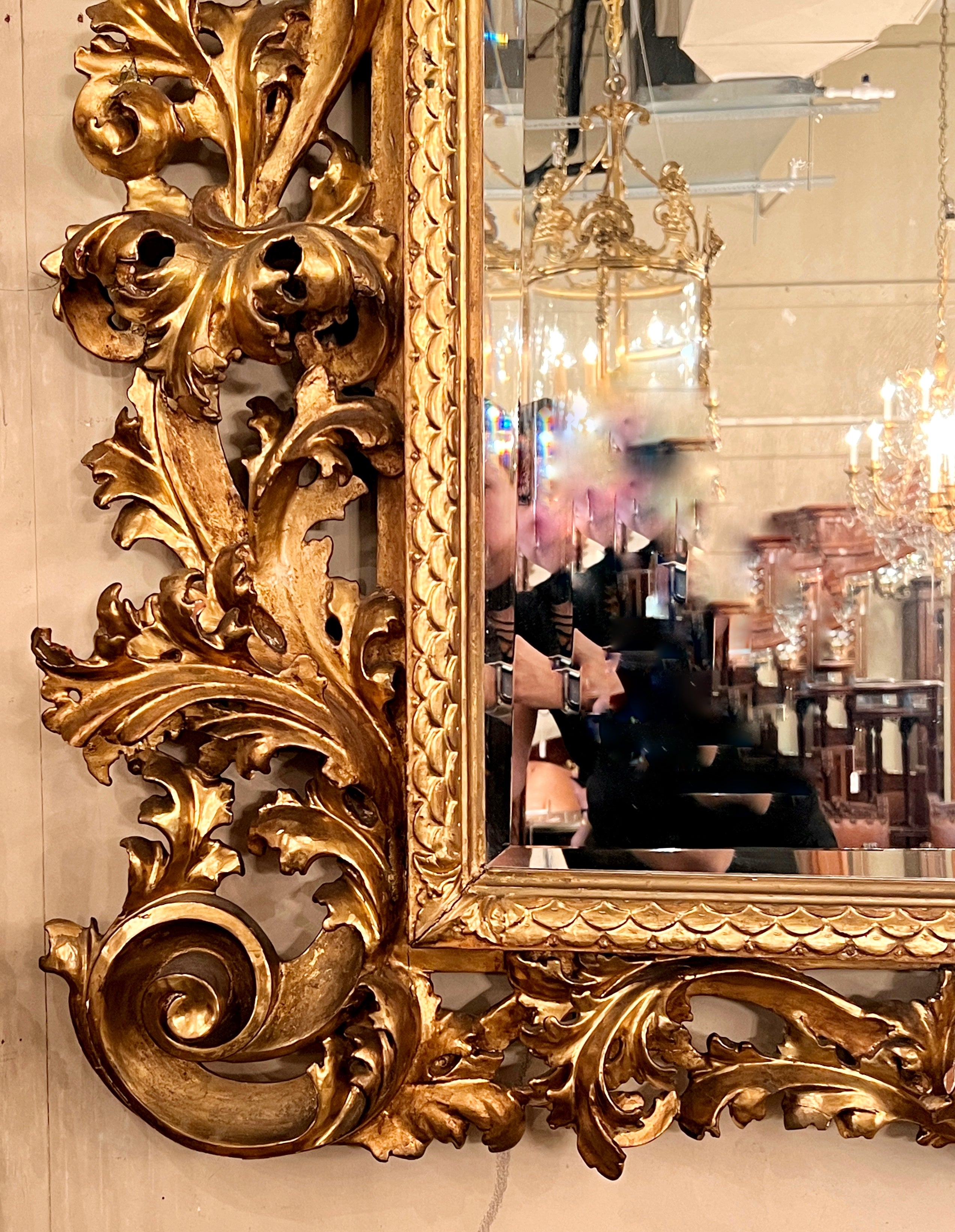 Antique 19th Century Venetian Carved Gilt Wood Framed Beveled Mirror.
This piece is palatial in size with magnificent carving and a substantial cartouche.