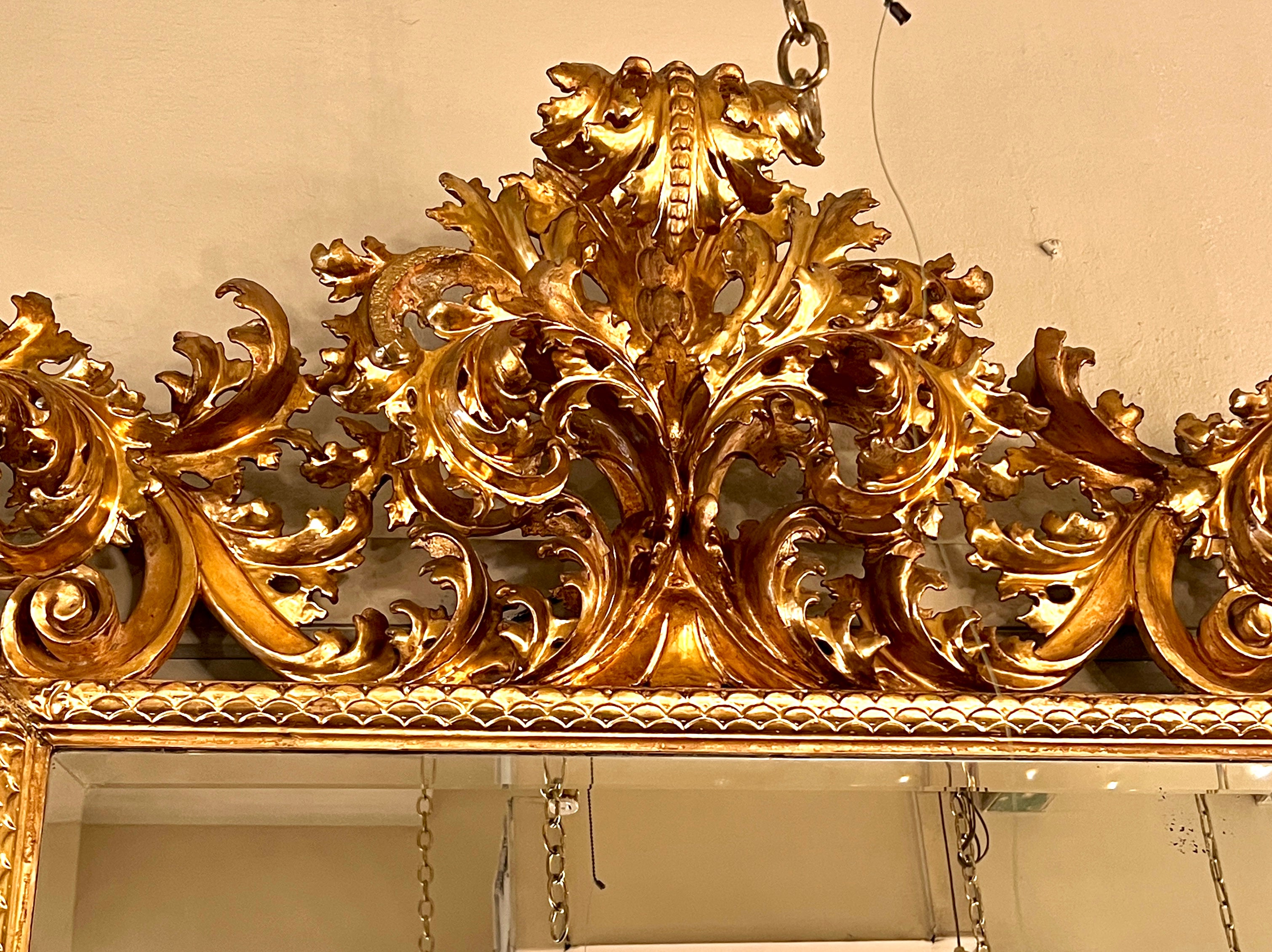 Italian Palatial Antique 19th Century Venetian Carved Gilt Wood Framed Beveled Mirror. For Sale