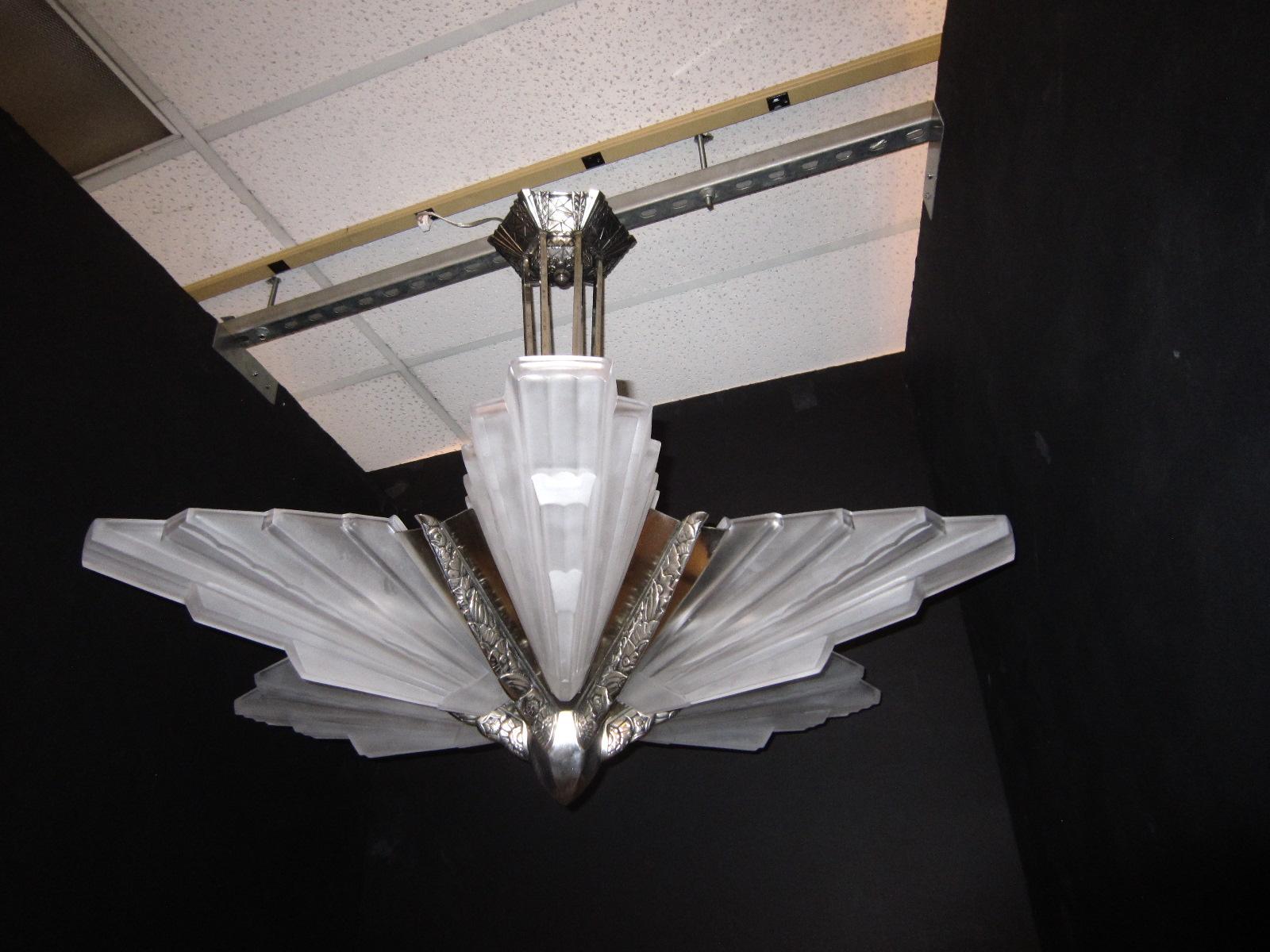An impressively huge six panel French Art Deco chandelier with large frosted 
