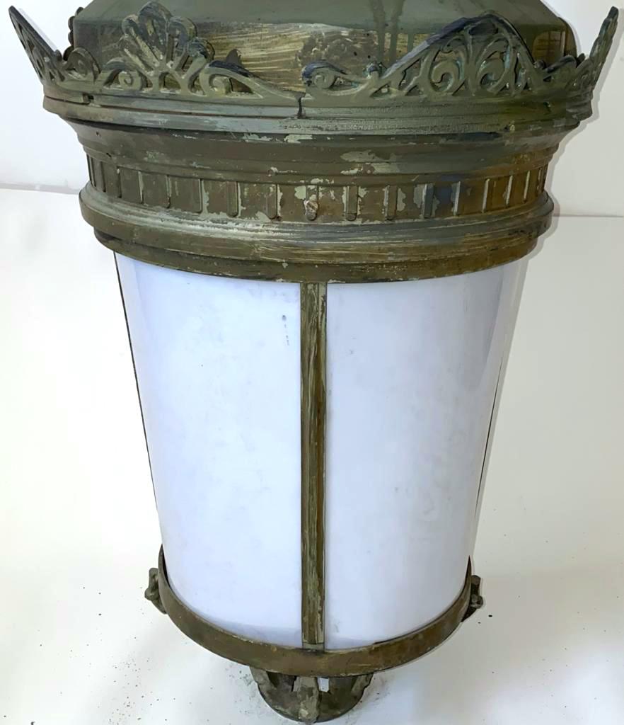 The Lantern pictured in this listing is Lantern #23

Details for This Lantern (Lantern #23):
• color is dark green
• cast aluminum and plexiglass
• weighs approximately 22 lbs
• is a hanging lantern and casts its light outward
• opens from