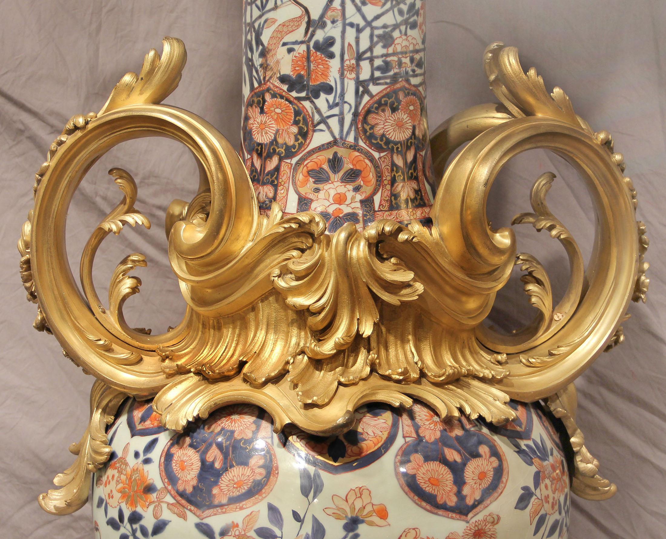 Japanese Palatial Pair of Mid-19th Century Gilt Bronze Mounted Imari Porcelain Torchères