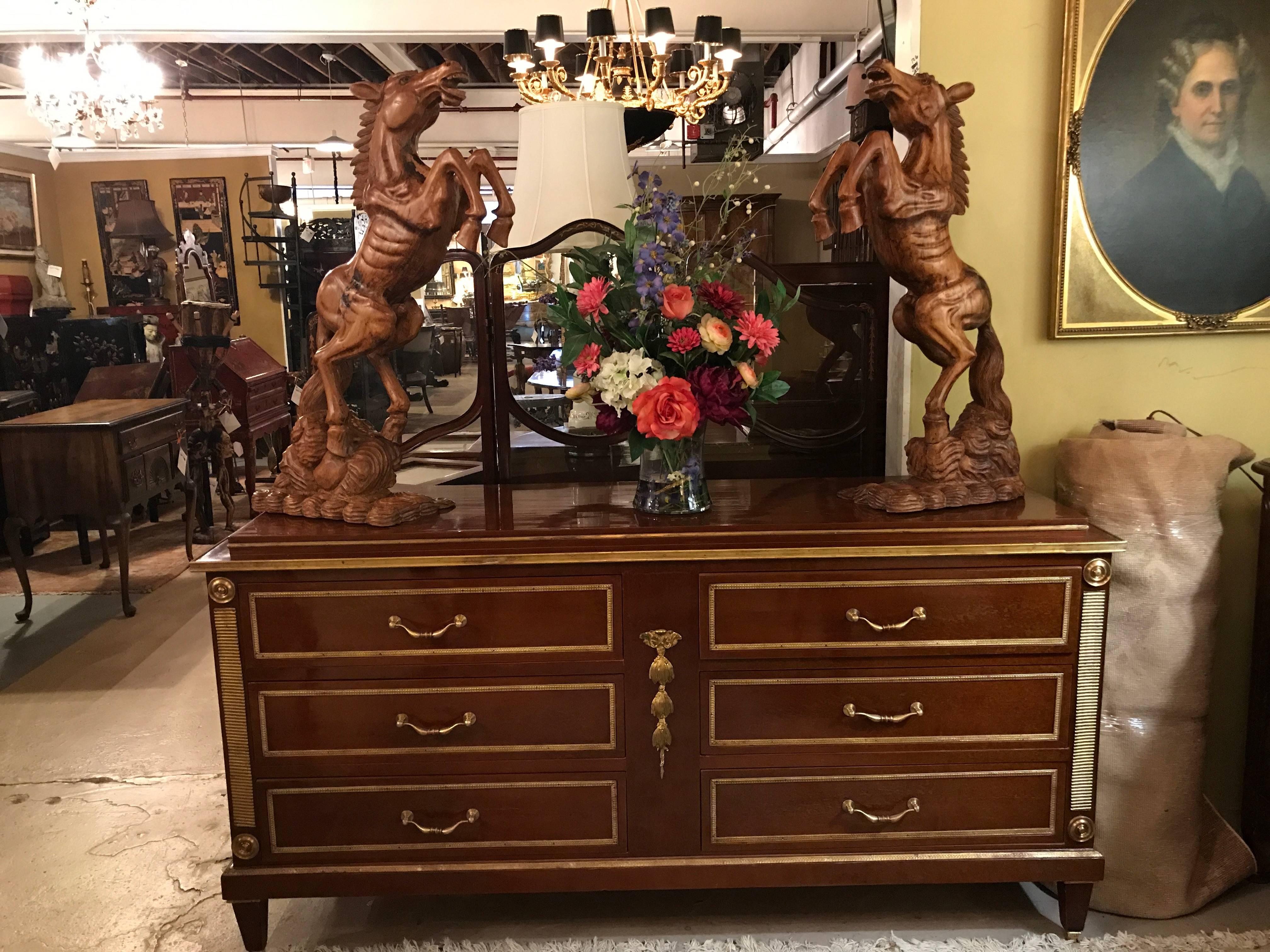 Palatial pair of Russian neoclassical style step up chests or commodes or sideboards. This finely constructed all oak secondary pair of commodes are large and more than impressive. Each having tapering legs with bronze sabots and caps leading to a