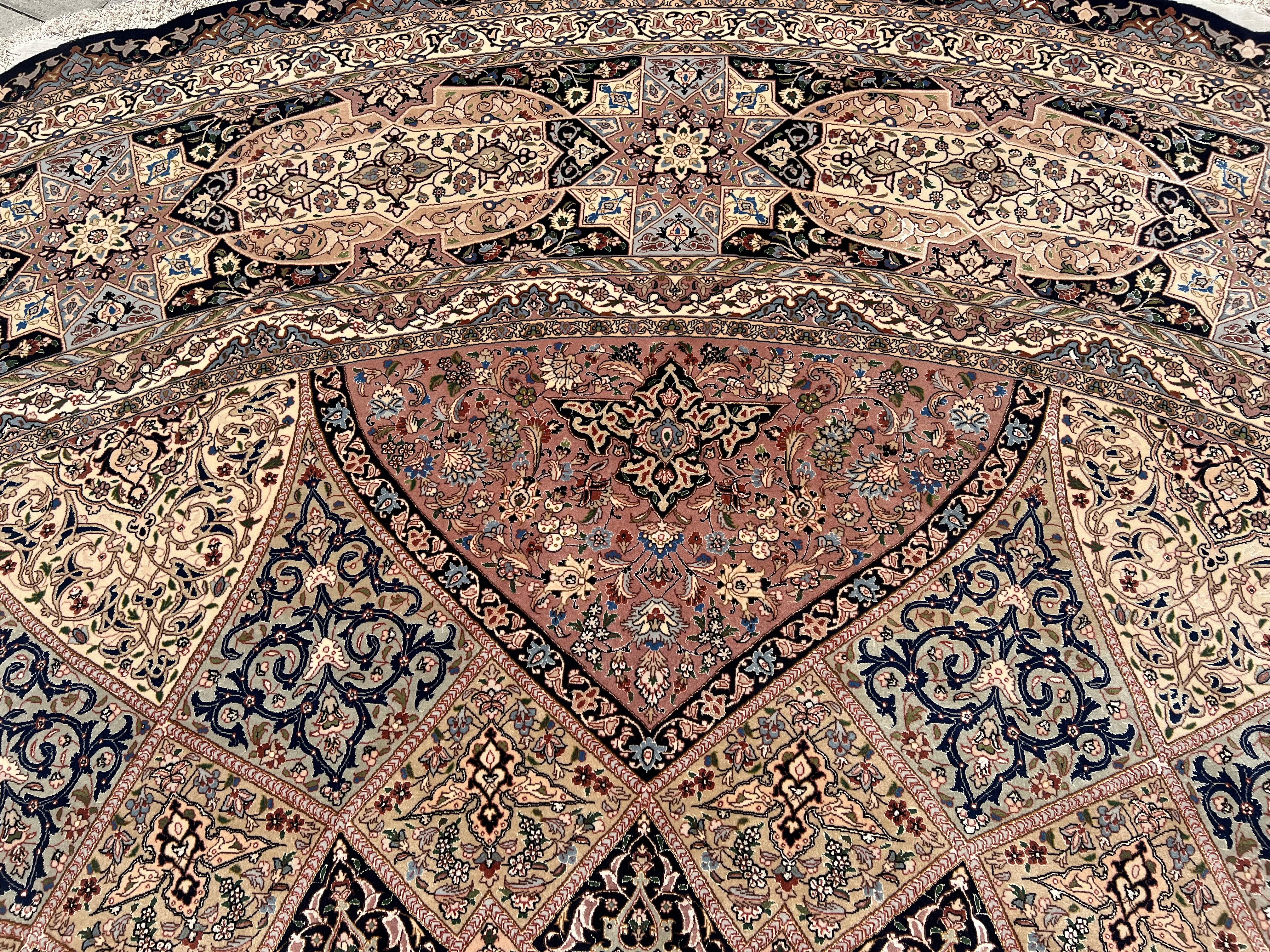 Palatial Persian Tabriz Silk & Wool Gonbad Design Circular Rug 
The word “Gonbad” translates from Farsi into “dome” in English. It refers to the ornate domes that are found in Mosques throughout the world. Therefore, Persian Gonbad rugs are those
