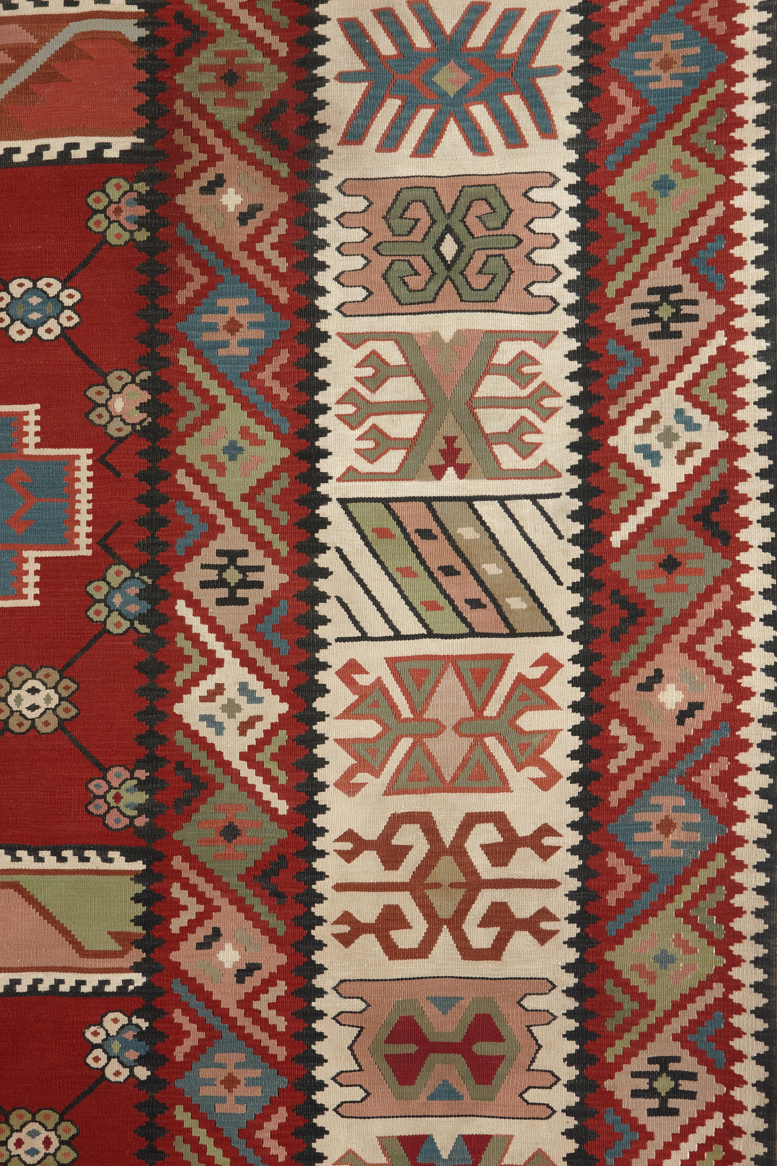 Native to the town of Pirot in Southeast Serbia, flat-woven carpets form the region an essential functional, cultural, and aesthetic component of the Balkan region. Known for their vertical looms and playful designs and geometric patterns, antique