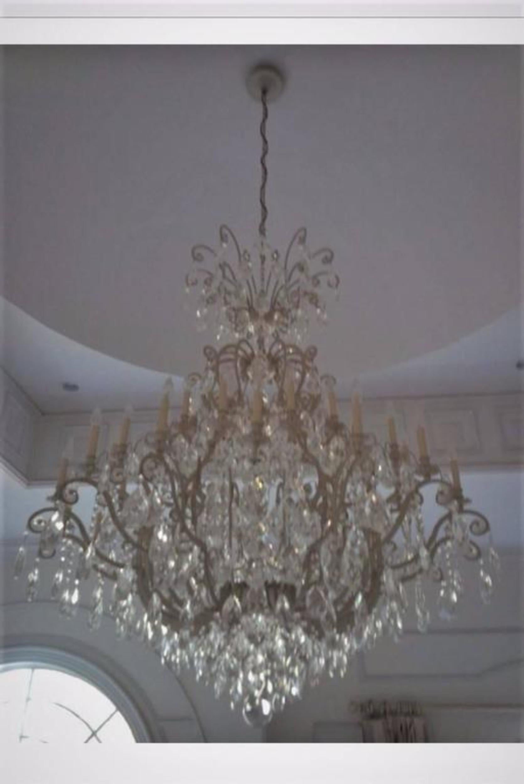 Palatial silver distressed rustic metal chandelier by Schonbek. A wonderful rustic silver metal chandelier by one of Germany's finest crystal chandelier makers. We have recently been commissioned to sell this fantastic group of lighting from a